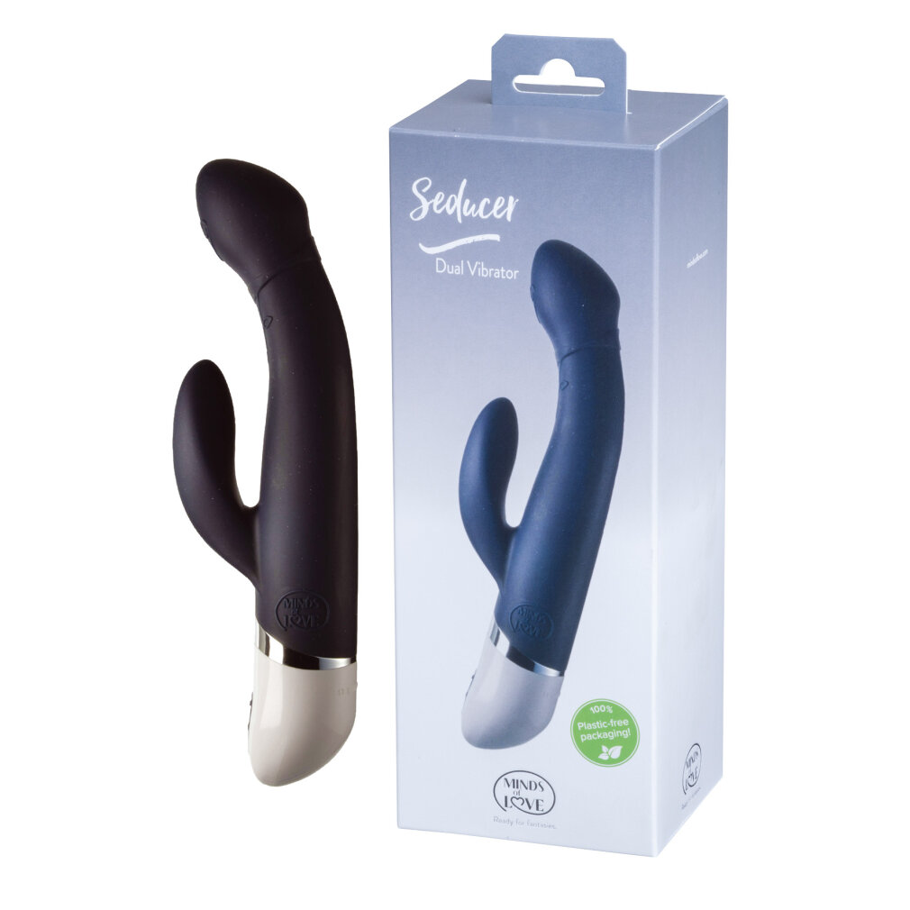 Ein schwarzer Dual-Vibrator neben seiner blauen Verpackung.