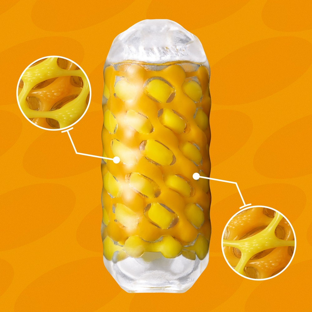 Ein gelbes, wabenartiges Spielzeug mit weißen Akzenten auf orangefarbenem Hintergrund.