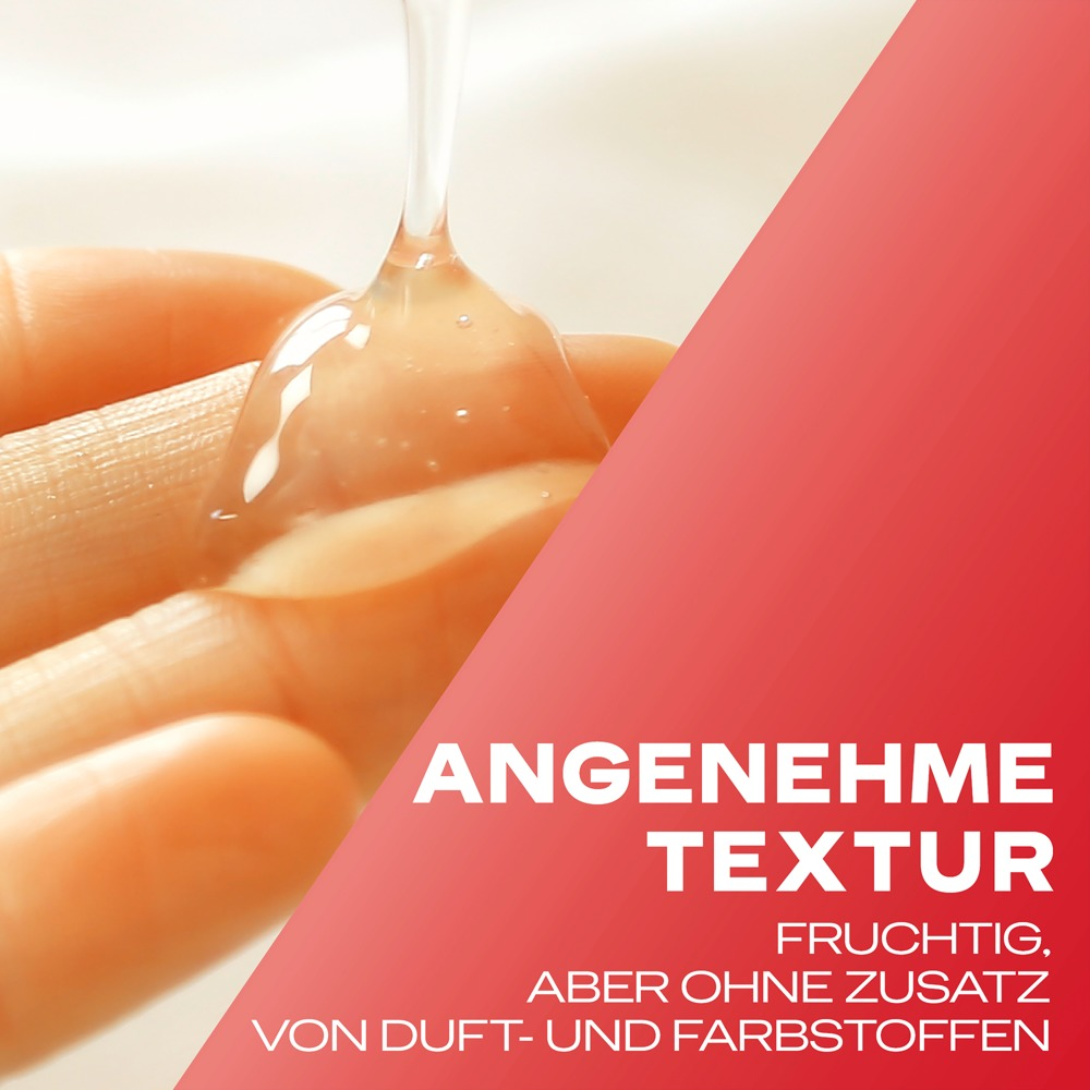 Eine Hand hält eine durchsichtige, gelartige Substanz, die tropft. Roter Text im Hintergrund.