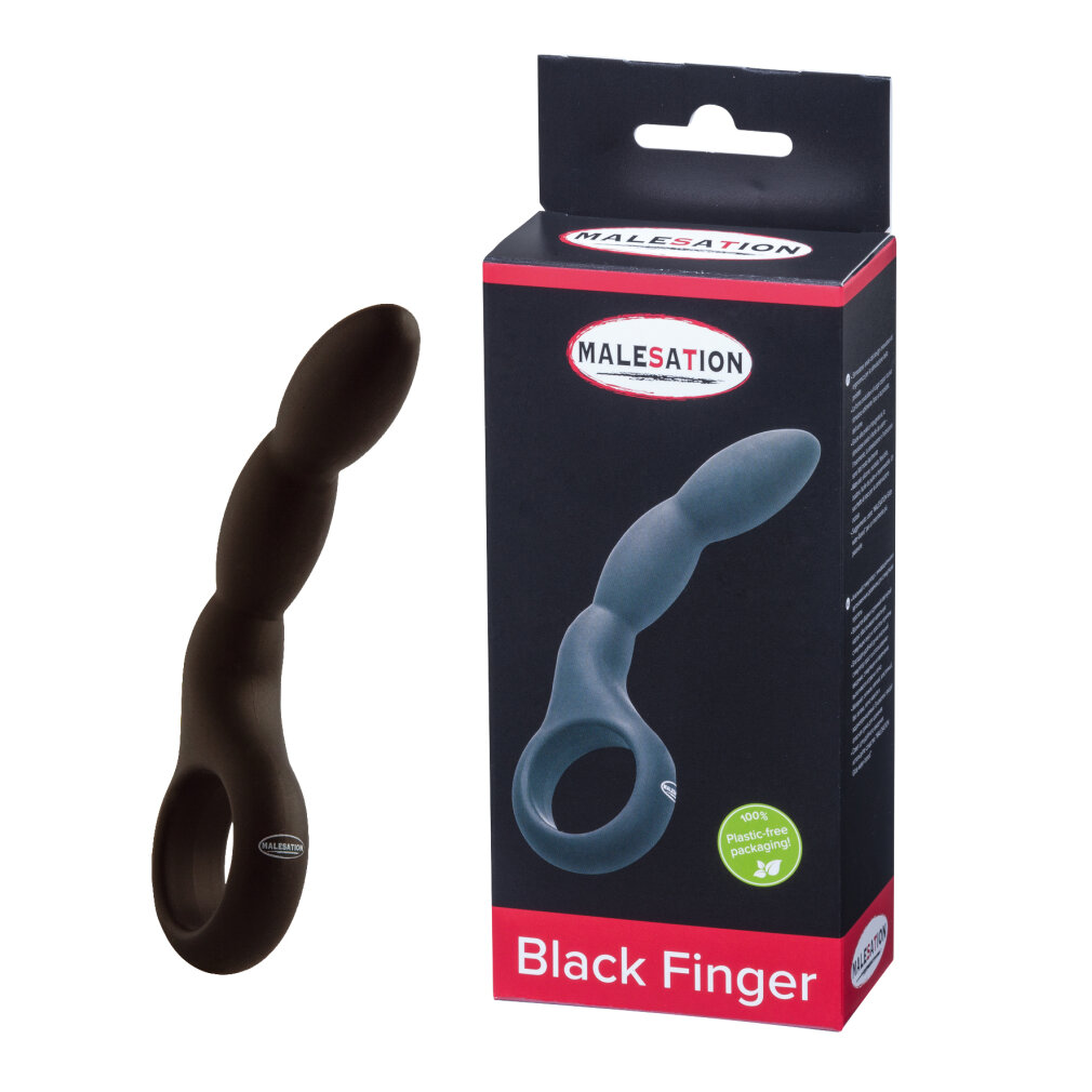 Ein schwarzer Finger mit einem Ring, daneben die Verpackung.