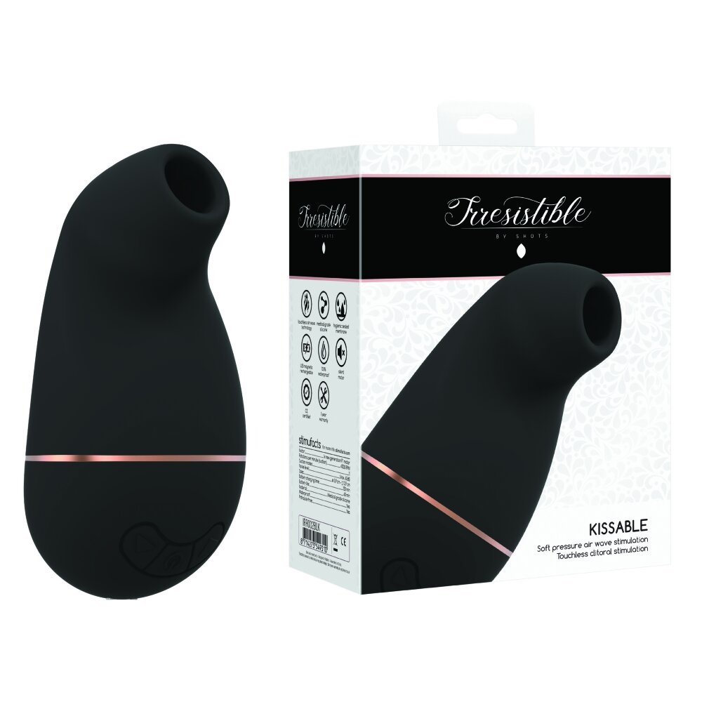 Schwarzer Vibrator und seine Verpackung. Roségoldene Akzente auf Vibrator und Verpackung.