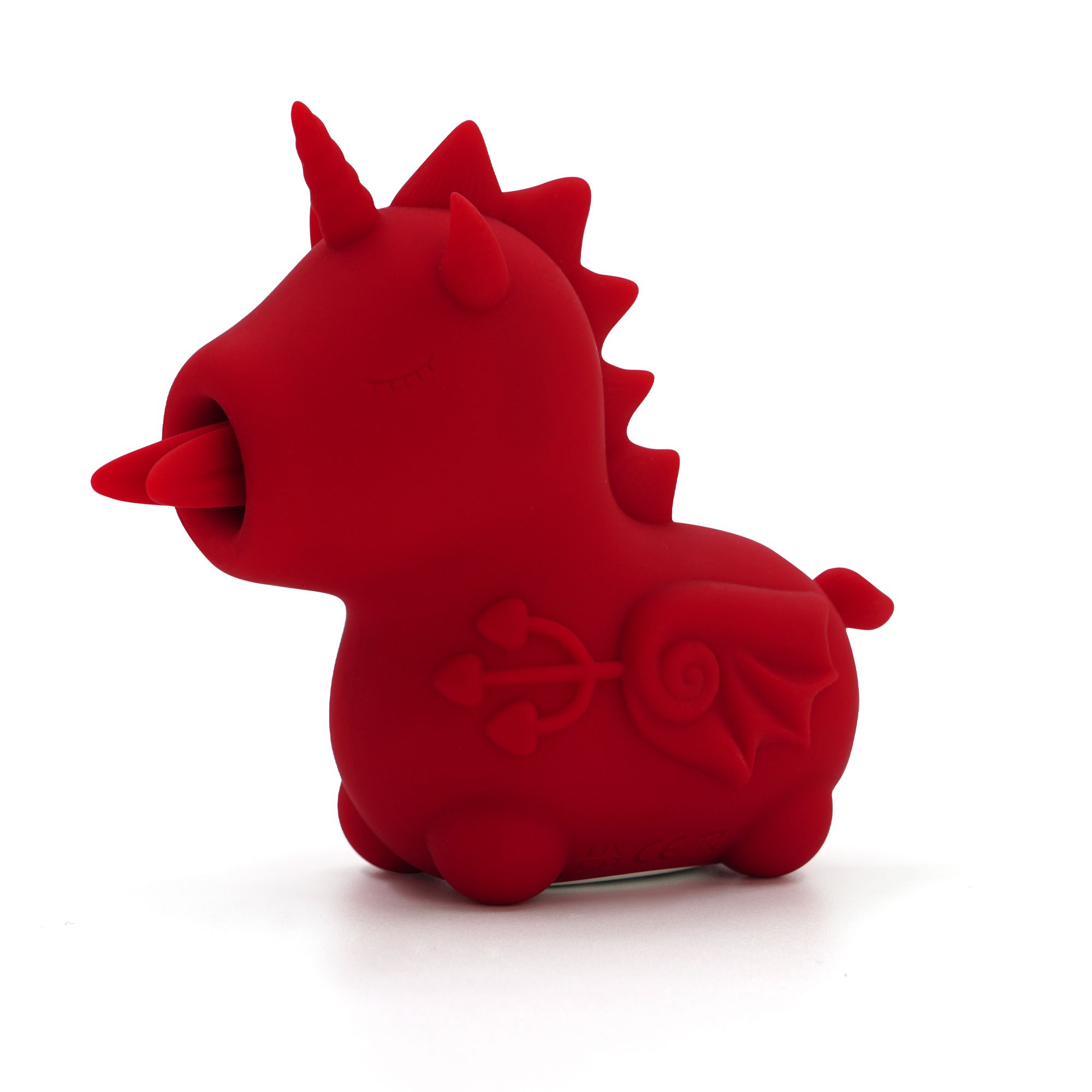 Eine rote Einhornfigur mit herausgestreckter Zunge und Flügeln. USB-Symbol auf der Seite.