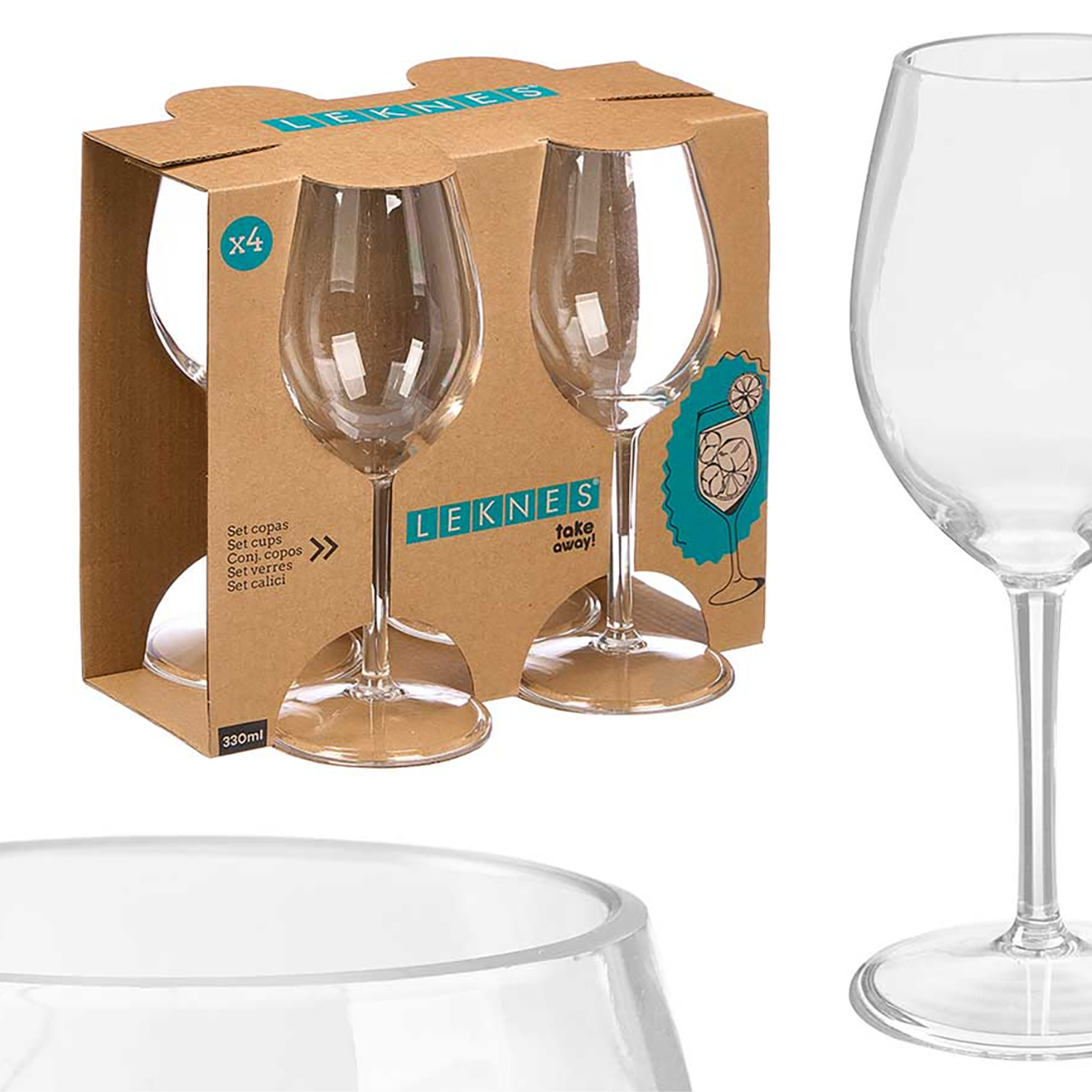 Quattro bicchieri da vino in una scatola, accanto a un bicchiere.