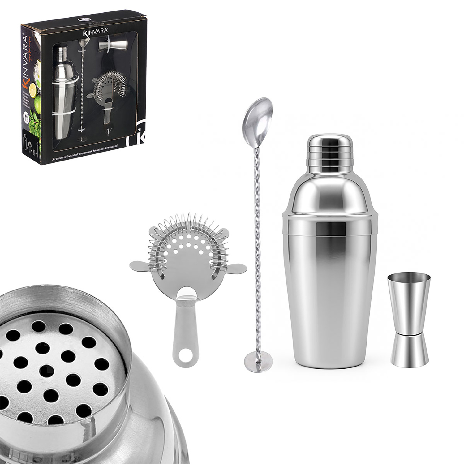 Un set da cocktail argentato con shaker, pestello, colino, bar spoon e misurino.