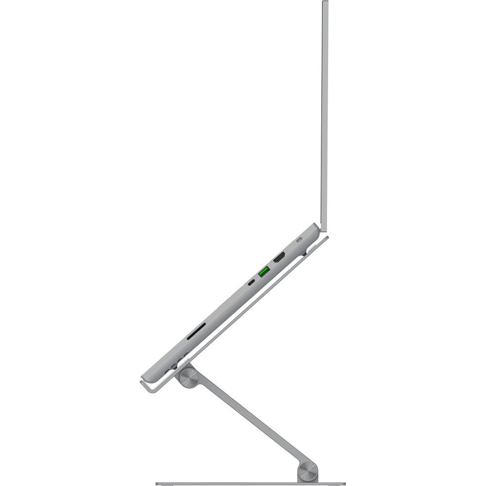 A silver laptop sits on a silver stand, side view.