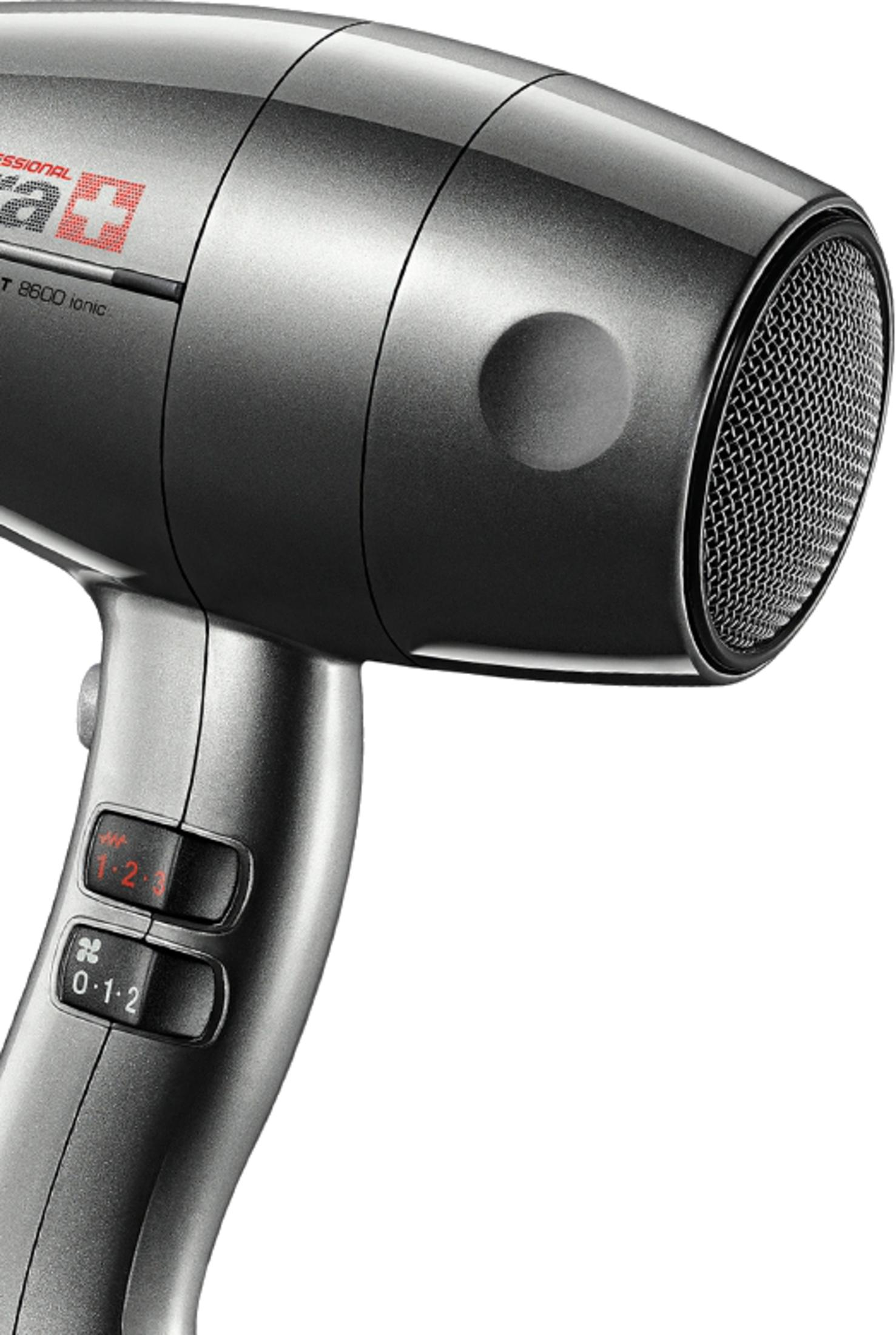 Un asciugacapelli grigio con controlli e griglia di ventilazione.