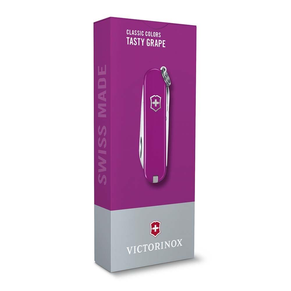Mor Victorinox çakı, üzerinde "Swiss Made" yazısı bulunan mor kutuda.