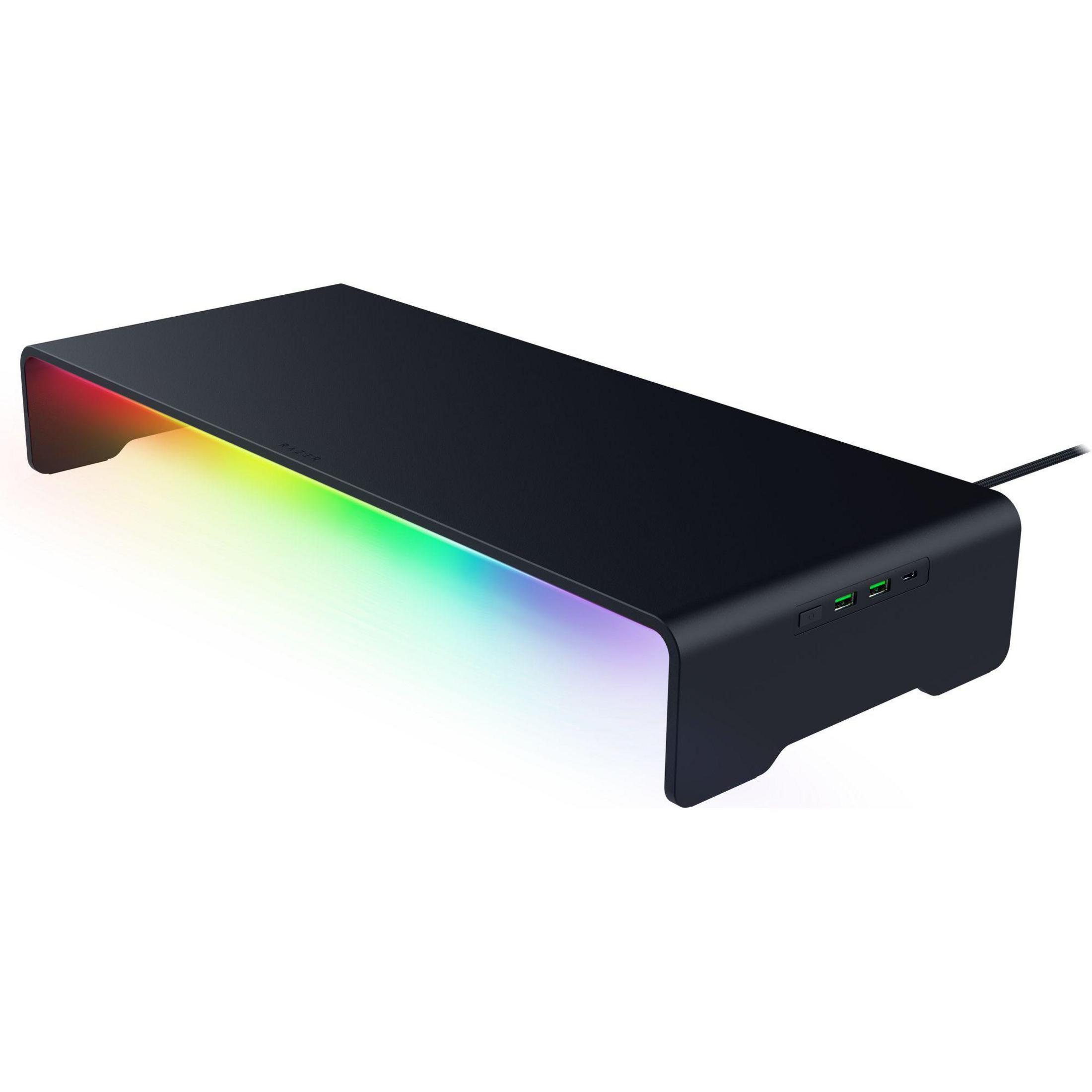 Schwarzer Monitorständer mit RGB-Beleuchtung und USB-Anschlüssen.