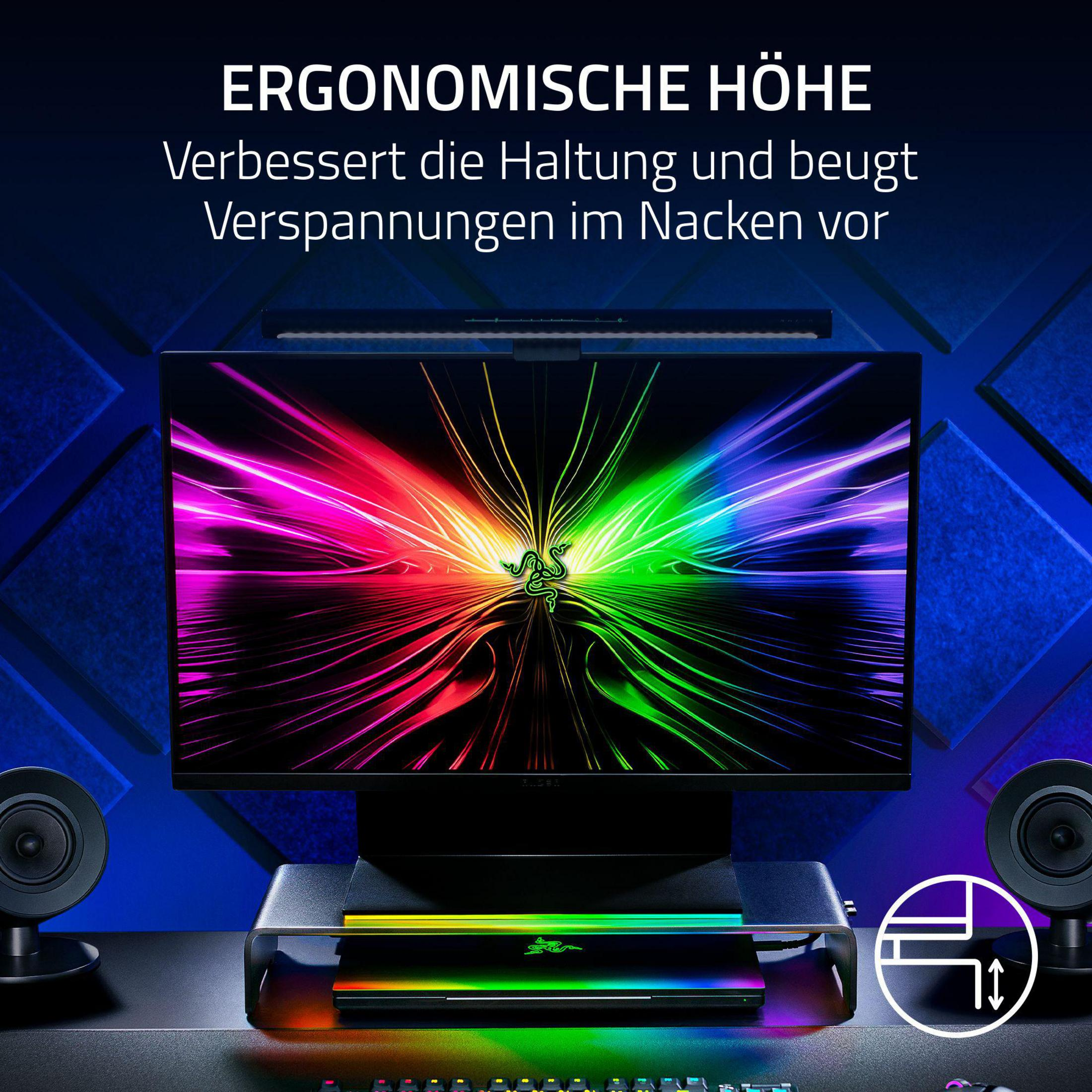 Ein Monitor mit Razer-Logo und RGB-Lichteffekten auf einem Ständer.