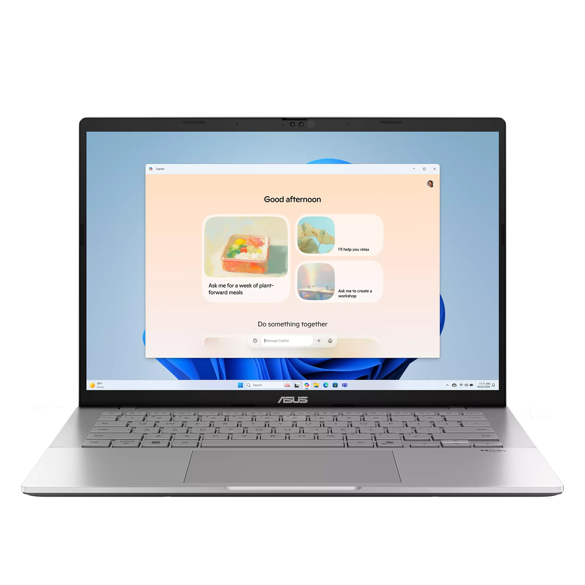 Windows 11 çalıştıran bir dizüstü bilgisayar, Copilot asistanını gösteriyor. "İyi günler" yazısı var.