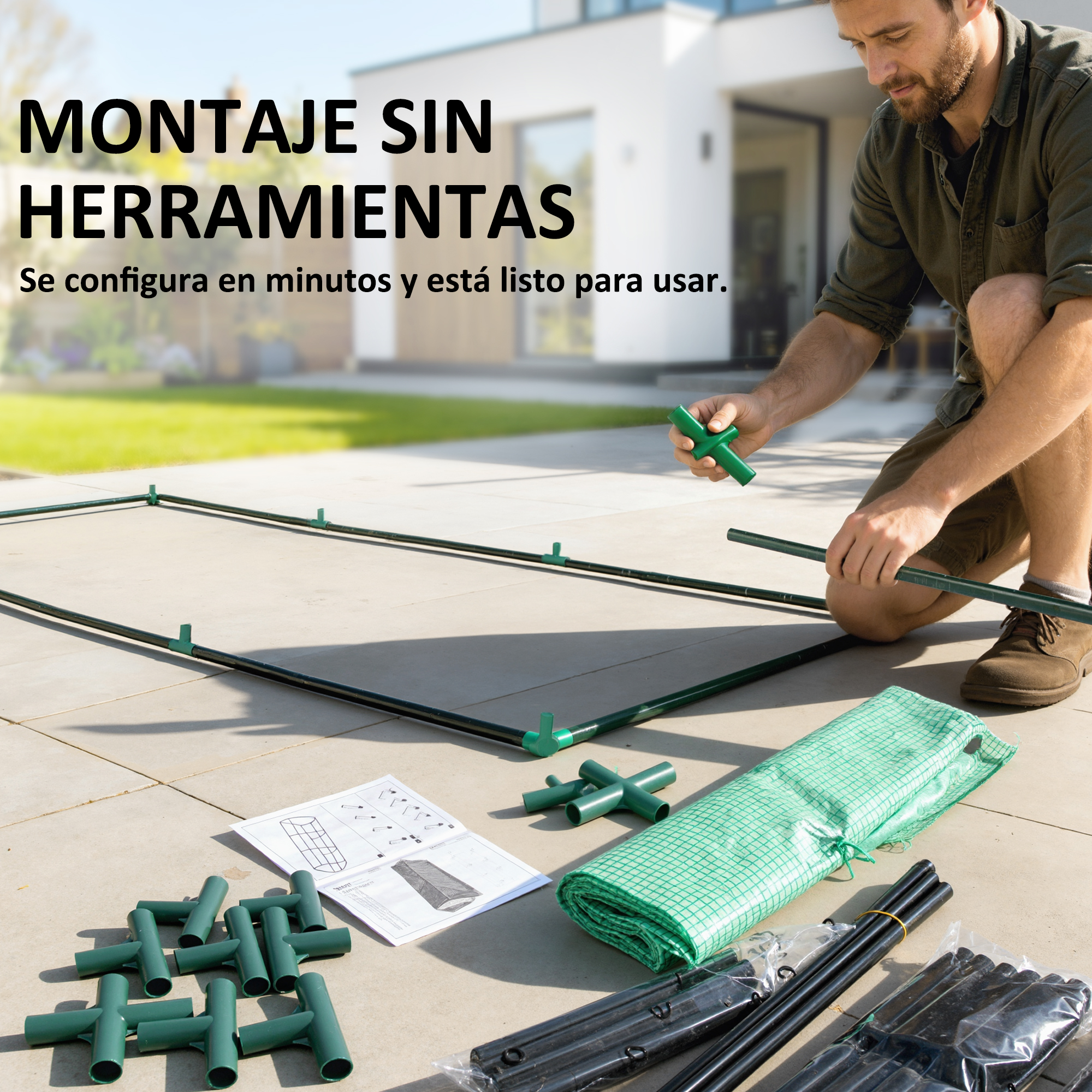 Hombre armando estructura de invernadero en patio con instrucciones.