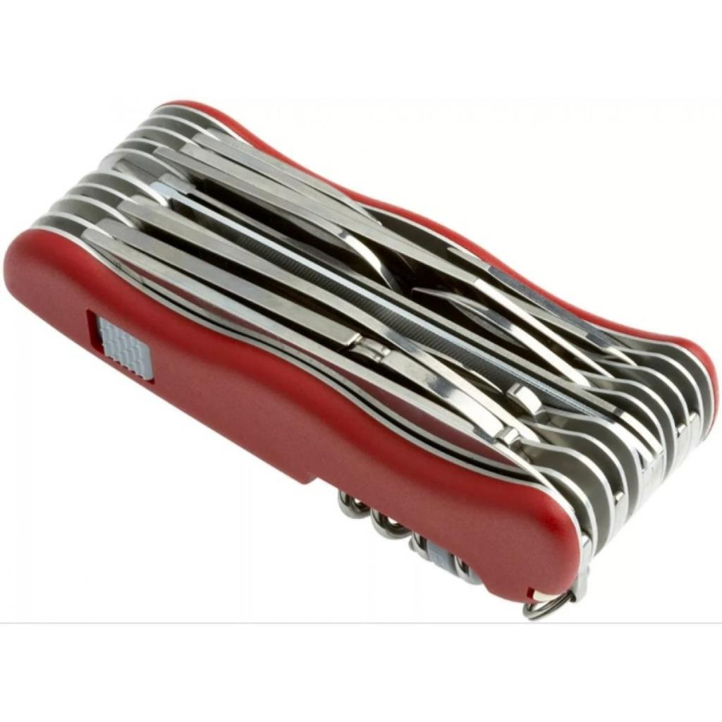 Açılmış birçok metal aletli kırmızı bir İsviçre çakısı.
