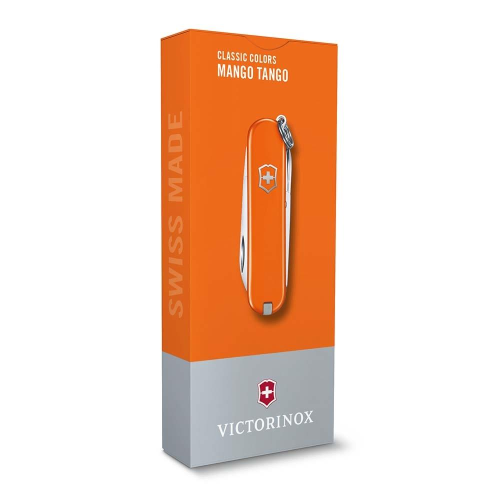 İsviçre çakısıyla turuncu kutu. Metin: Swiss Made, Classic Colors, Mango Tango, Victorinox.