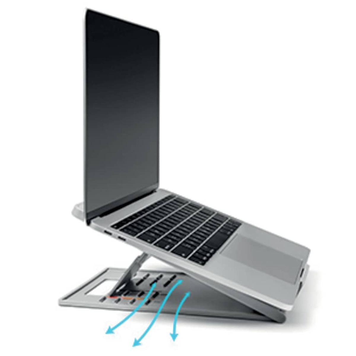 A laptop rests on a stand with ventilation holes.