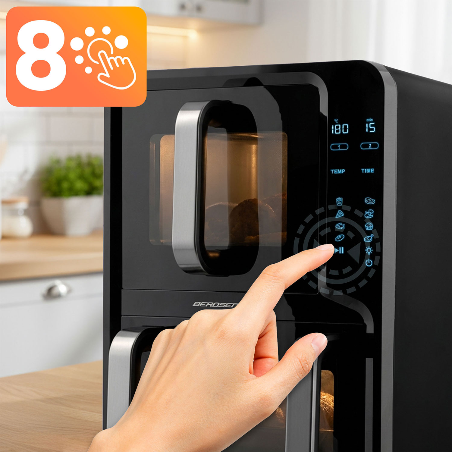 Ręka obsługuje czarną frytkownicę beztłuszczową z cyfrowym wyświetlaczem.