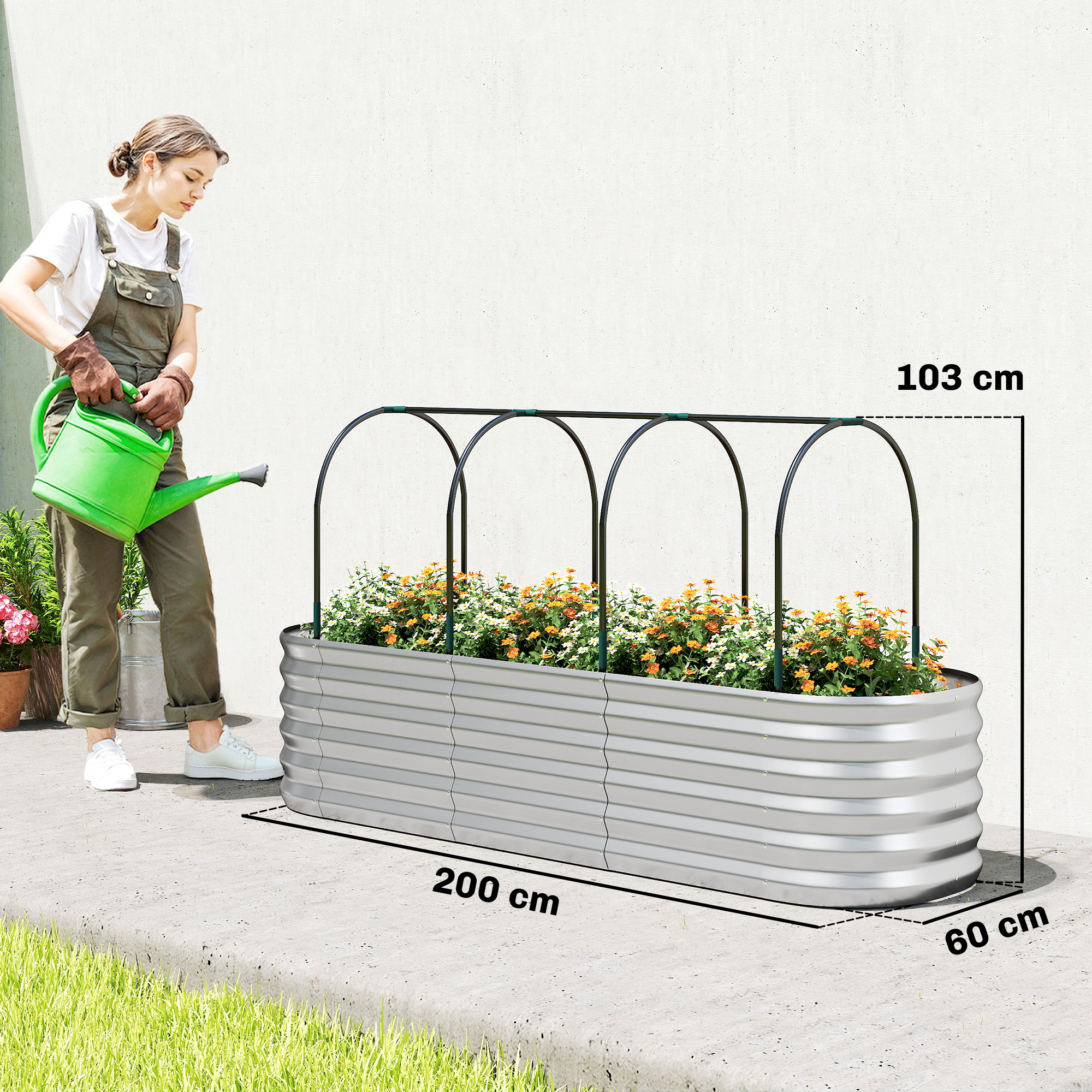 Una mujer riega flores en un bancal elevado. Dimensiones: 200x60x103cm.