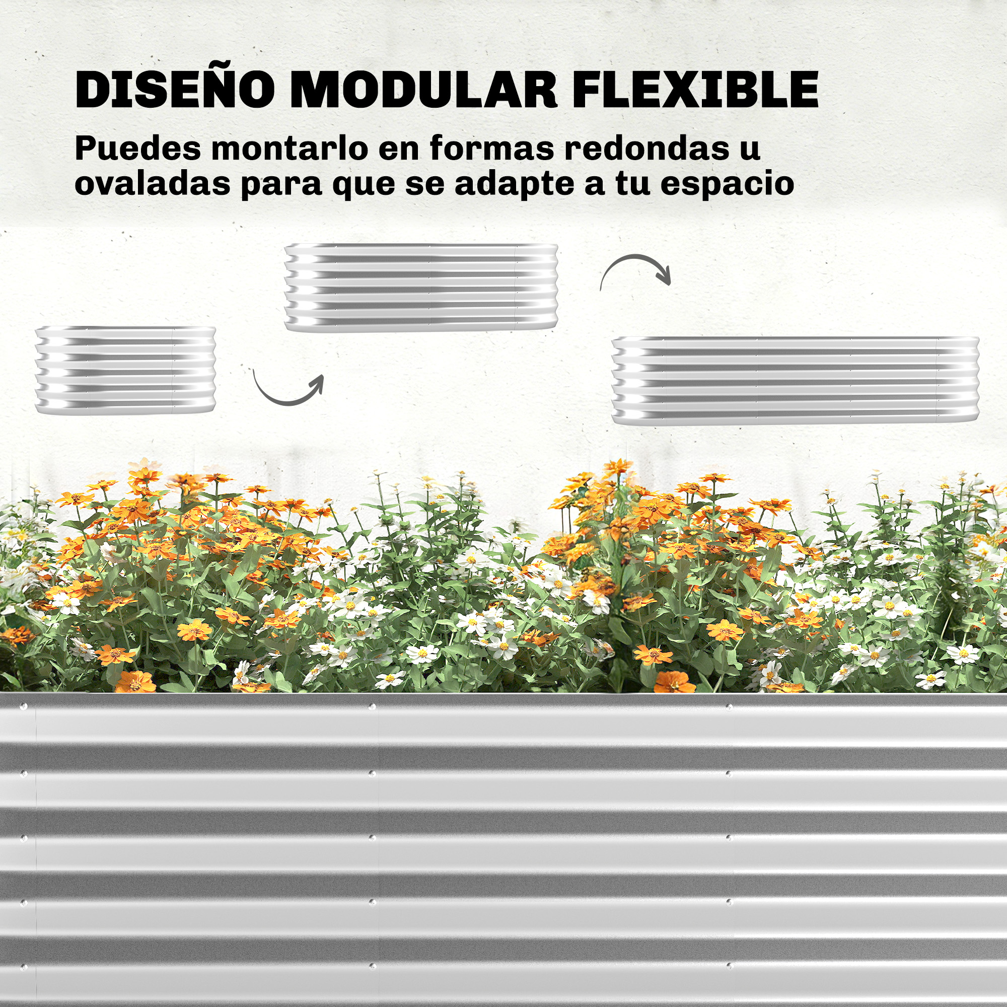 Un bancal elevado de metal plateado con flores naranjas y blancas.