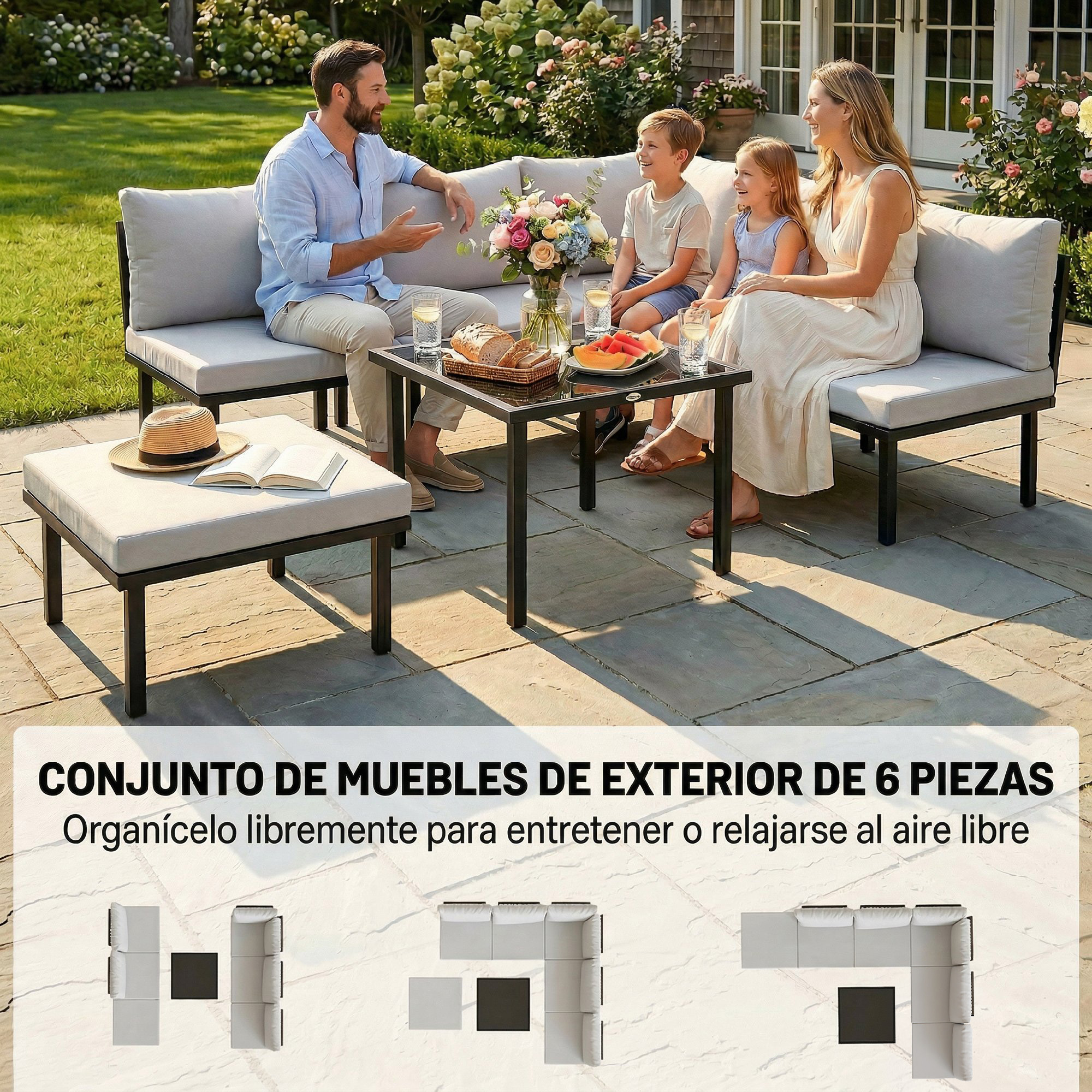 Familia relajándose en muebles de exterior con mesa, flores y fruta.