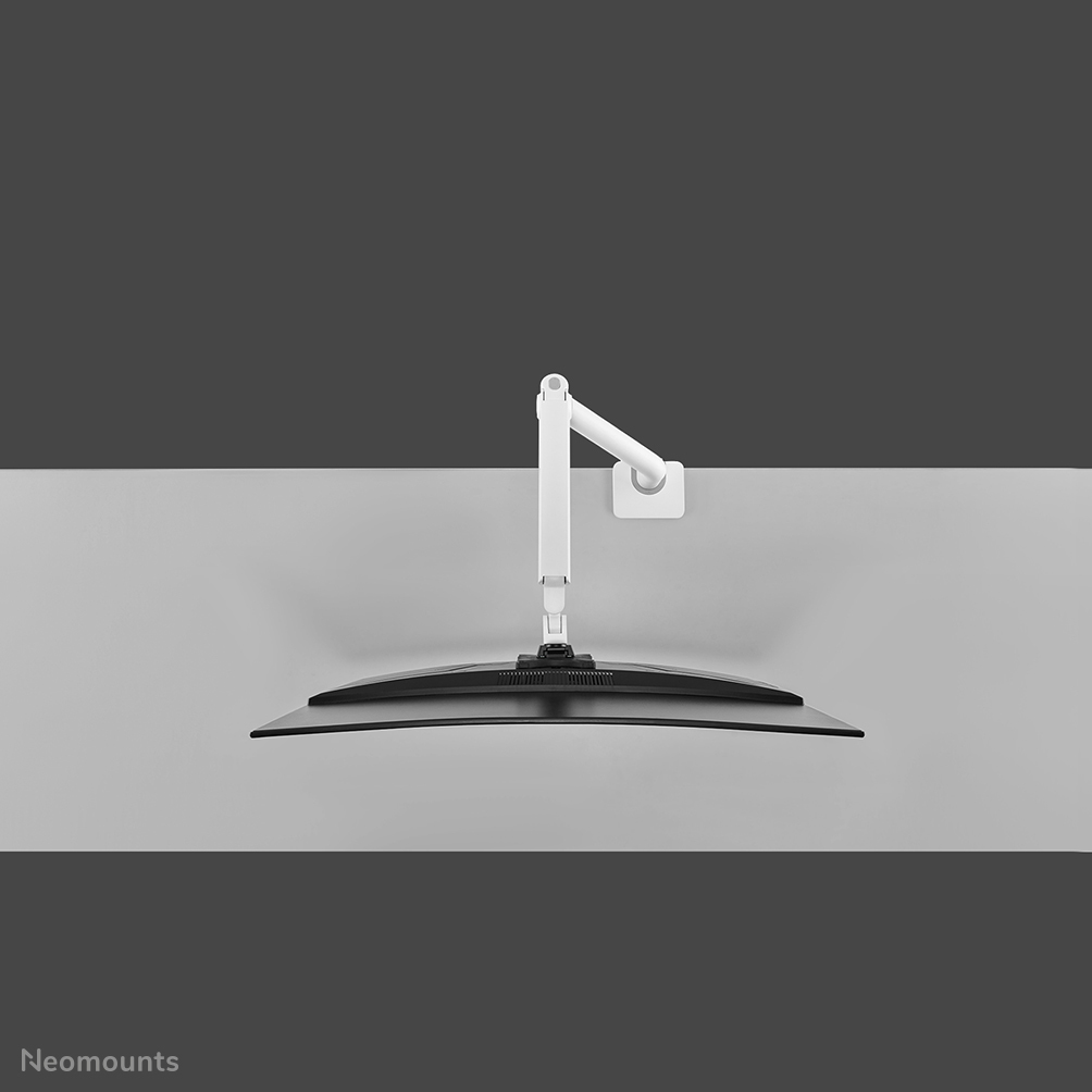 A curved monitor is mounted on a white adjustable arm attached to a wall.