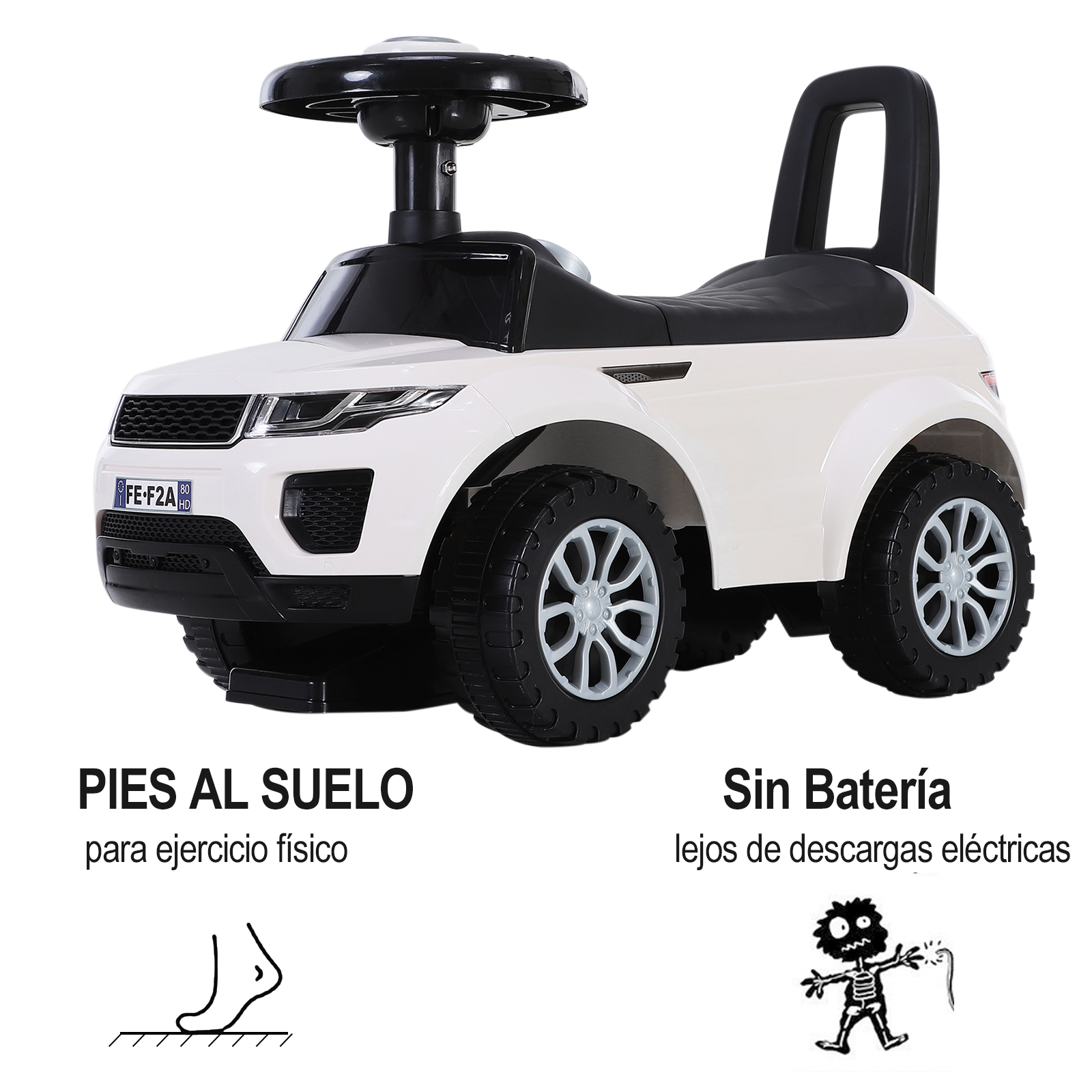 Un coche de juguete blanco con volante y asiento negros. Texto en español.