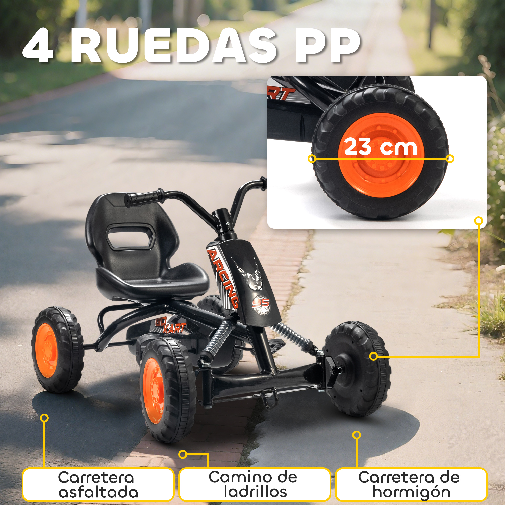 Un go-kart negro con ruedas naranjas está en un camino.