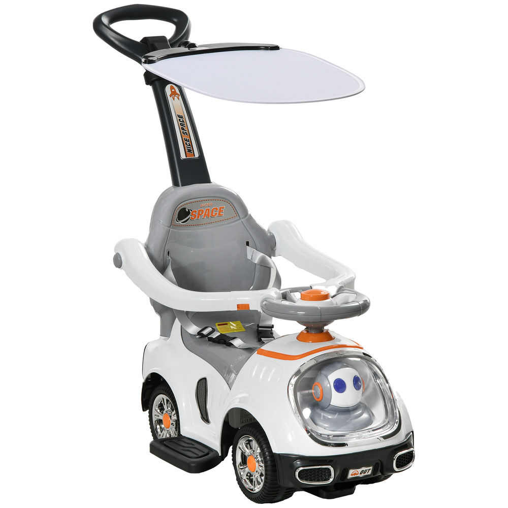 Un coche de juguete blanco y gris para niños con capota y cara de robot.