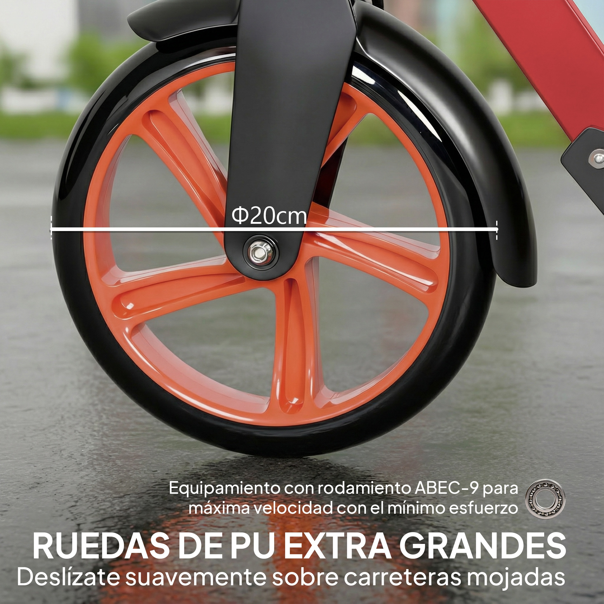 Rueda grande naranja con llanta negra, guardabarros y marco rojo.