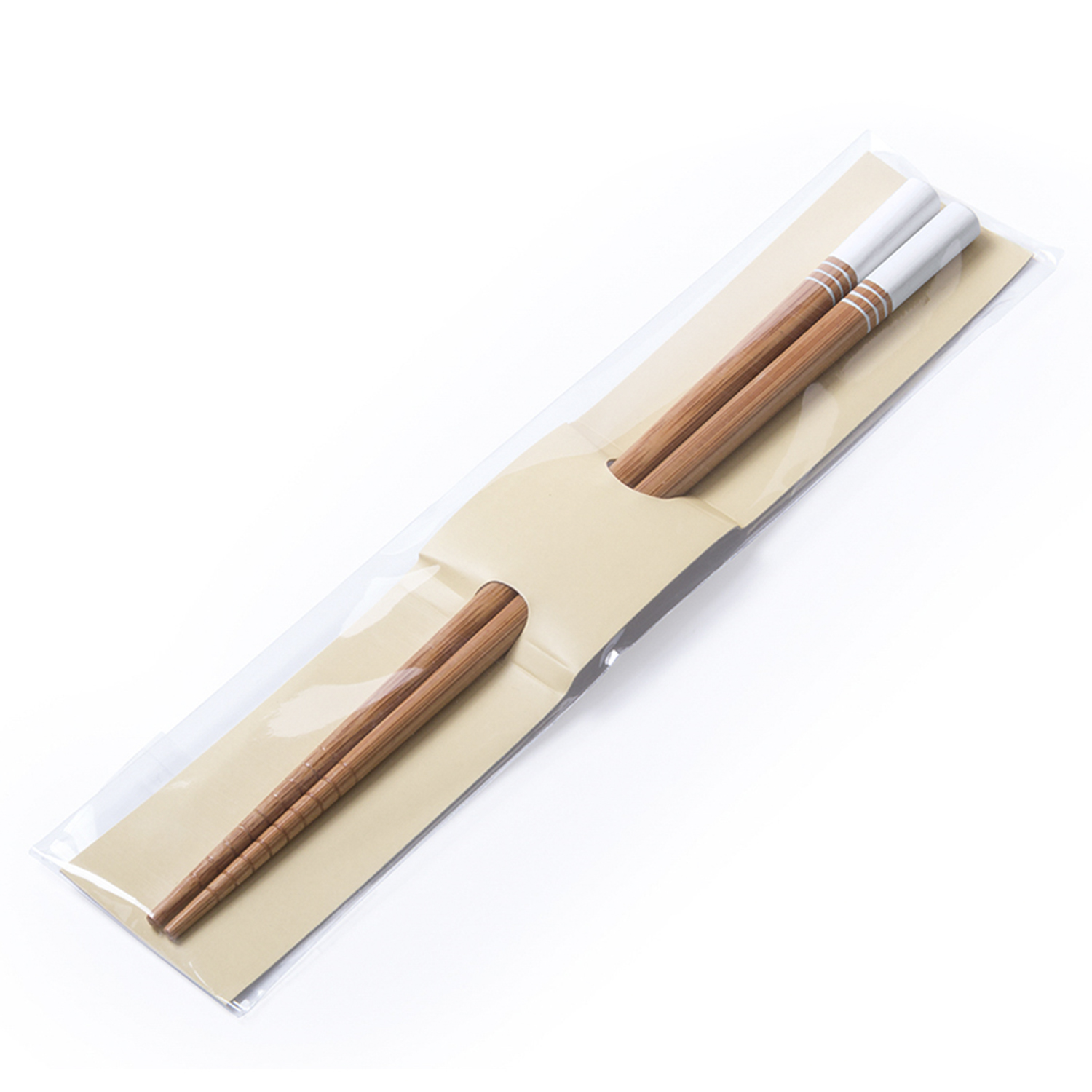 Palillos de madera con puntas blancas y anillos plateados en embalaje transparente.
