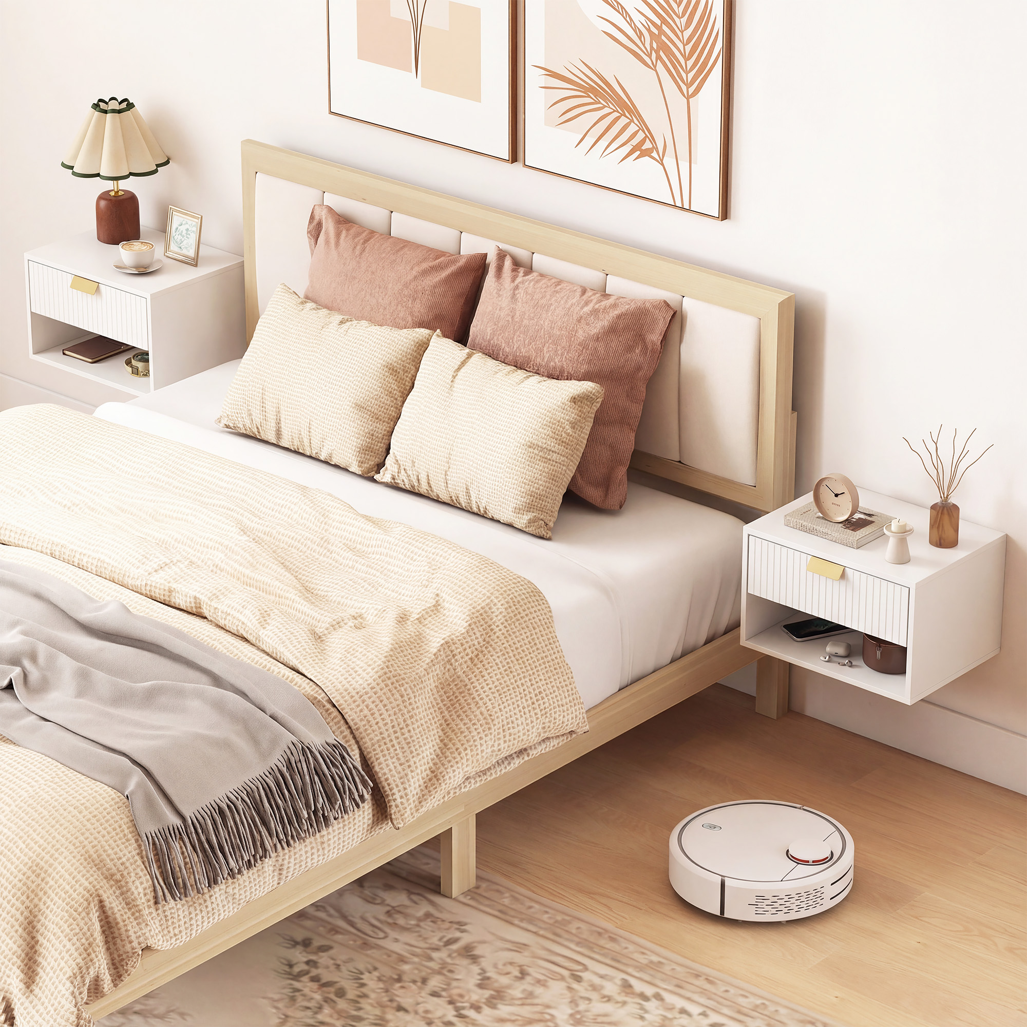 Un dormitorio moderno con cama, mesitas de noche, arte y un robot aspirador.