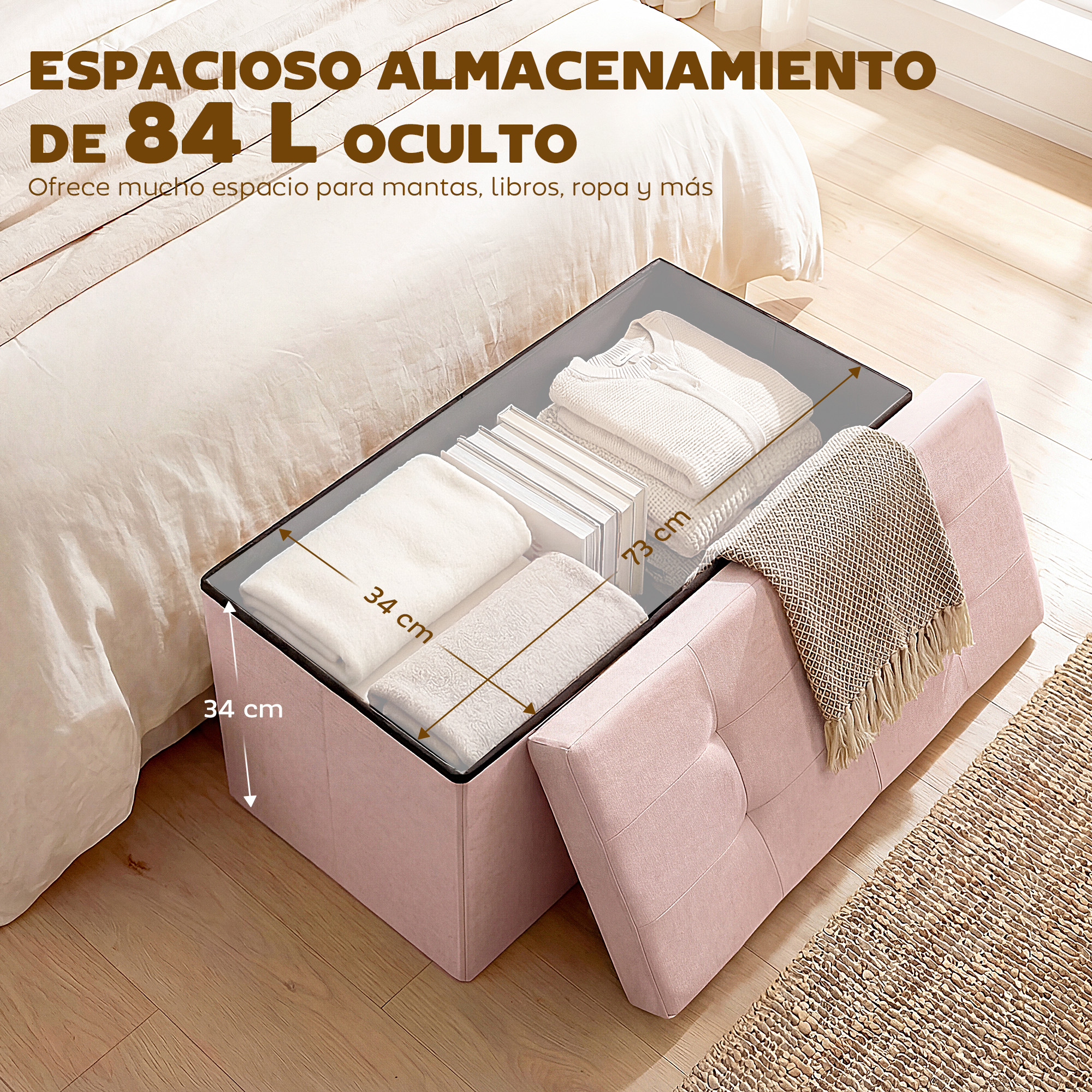 Un otomán de almacenamiento rosa junto a una cama, lleno de ropa y libros.