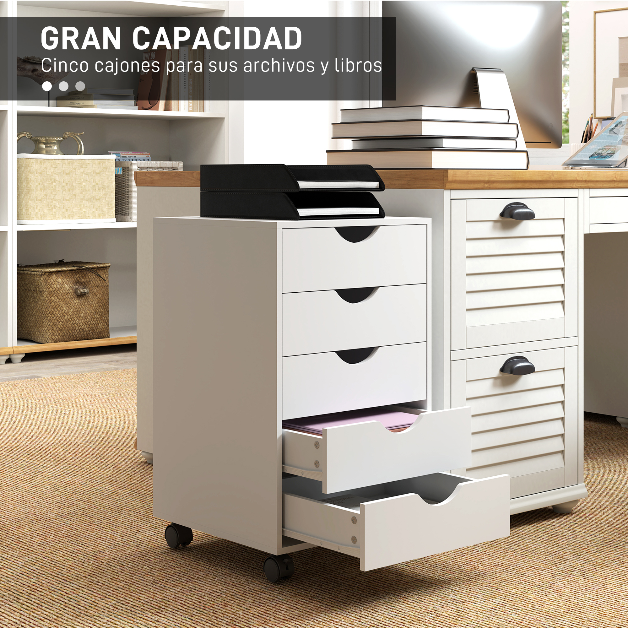 Un archivador blanco con ruedas junto a un escritorio.