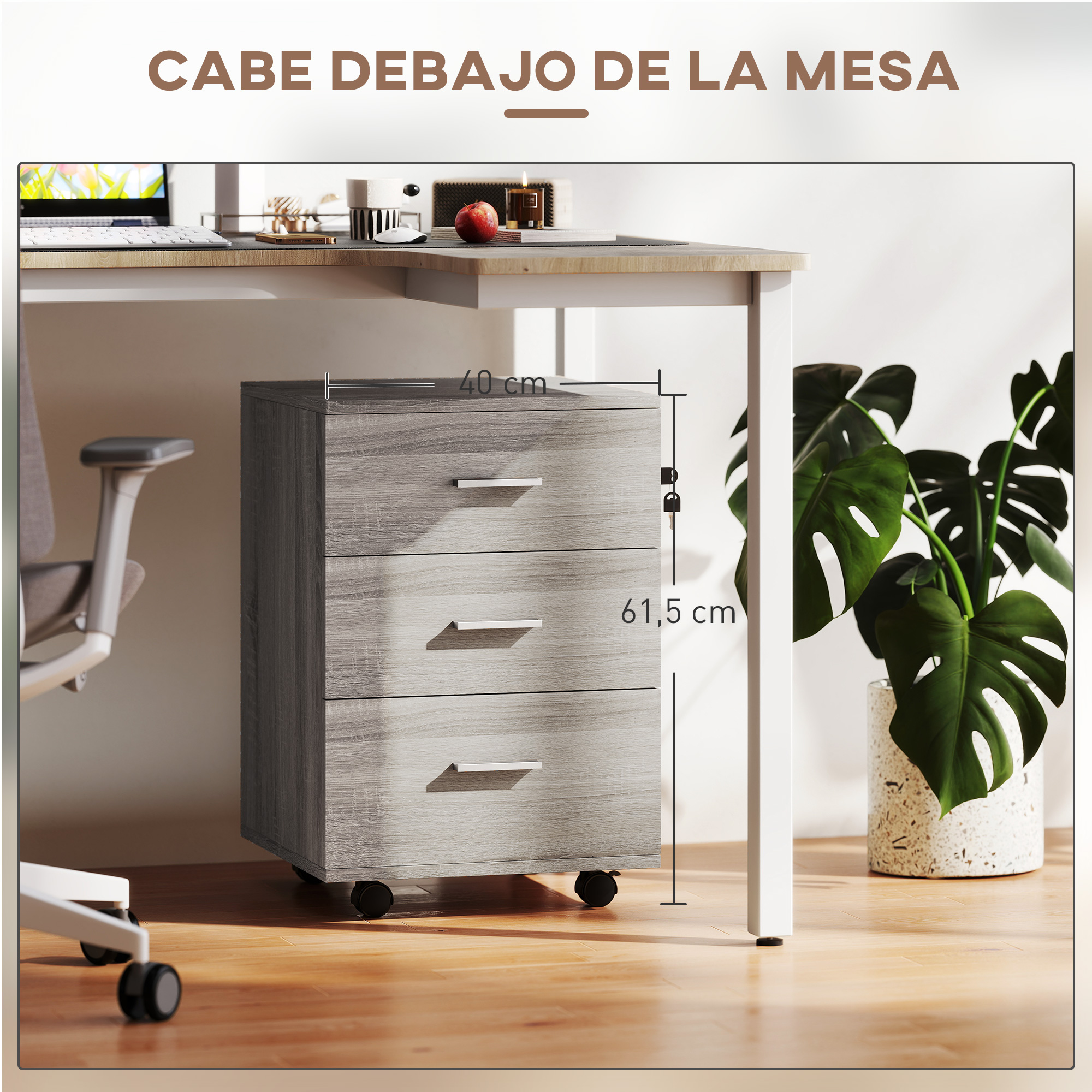 Cajonera rodante gris de tres cajones debajo de un escritorio.