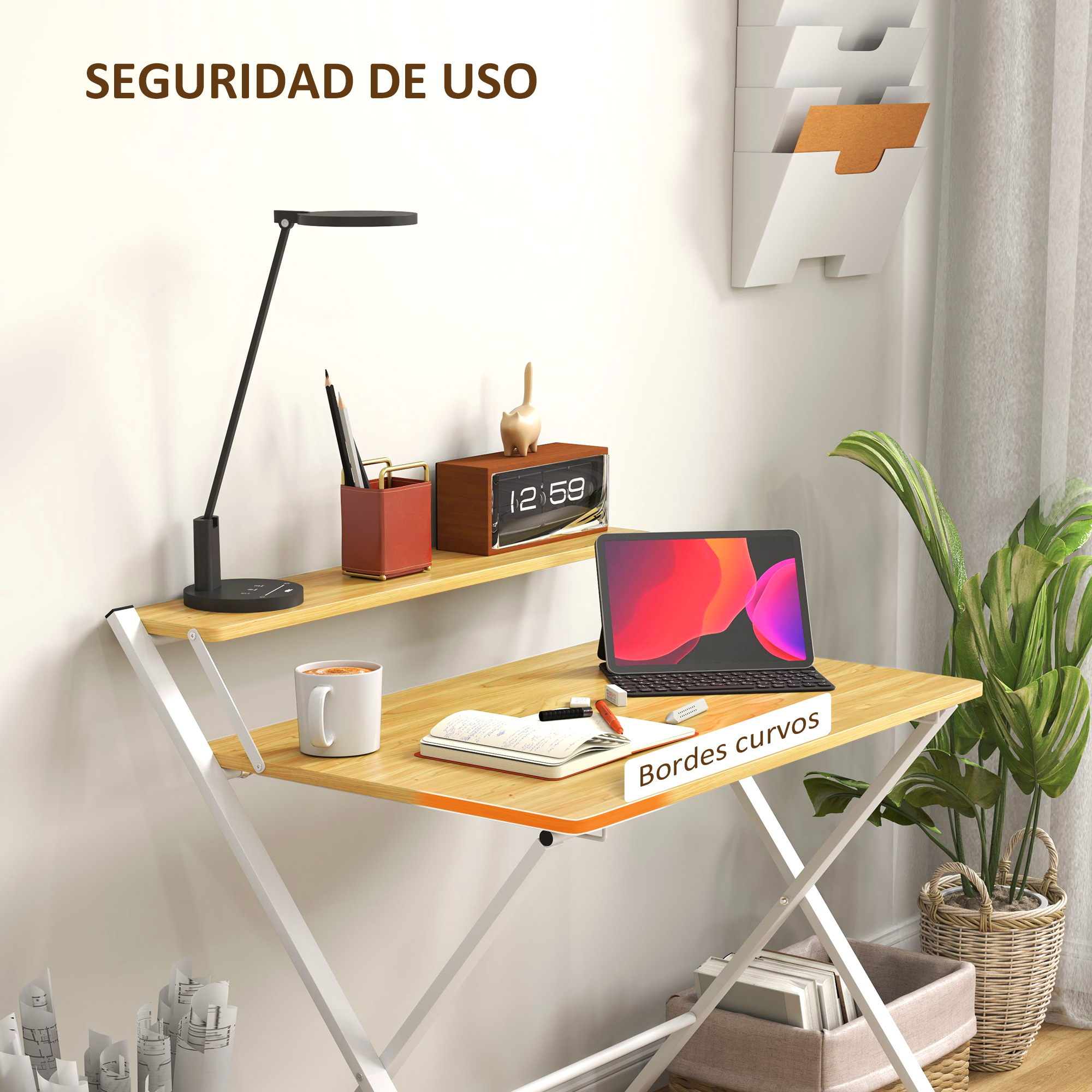 Un escritorio con portátil, cuaderno, taza y lámpara.
