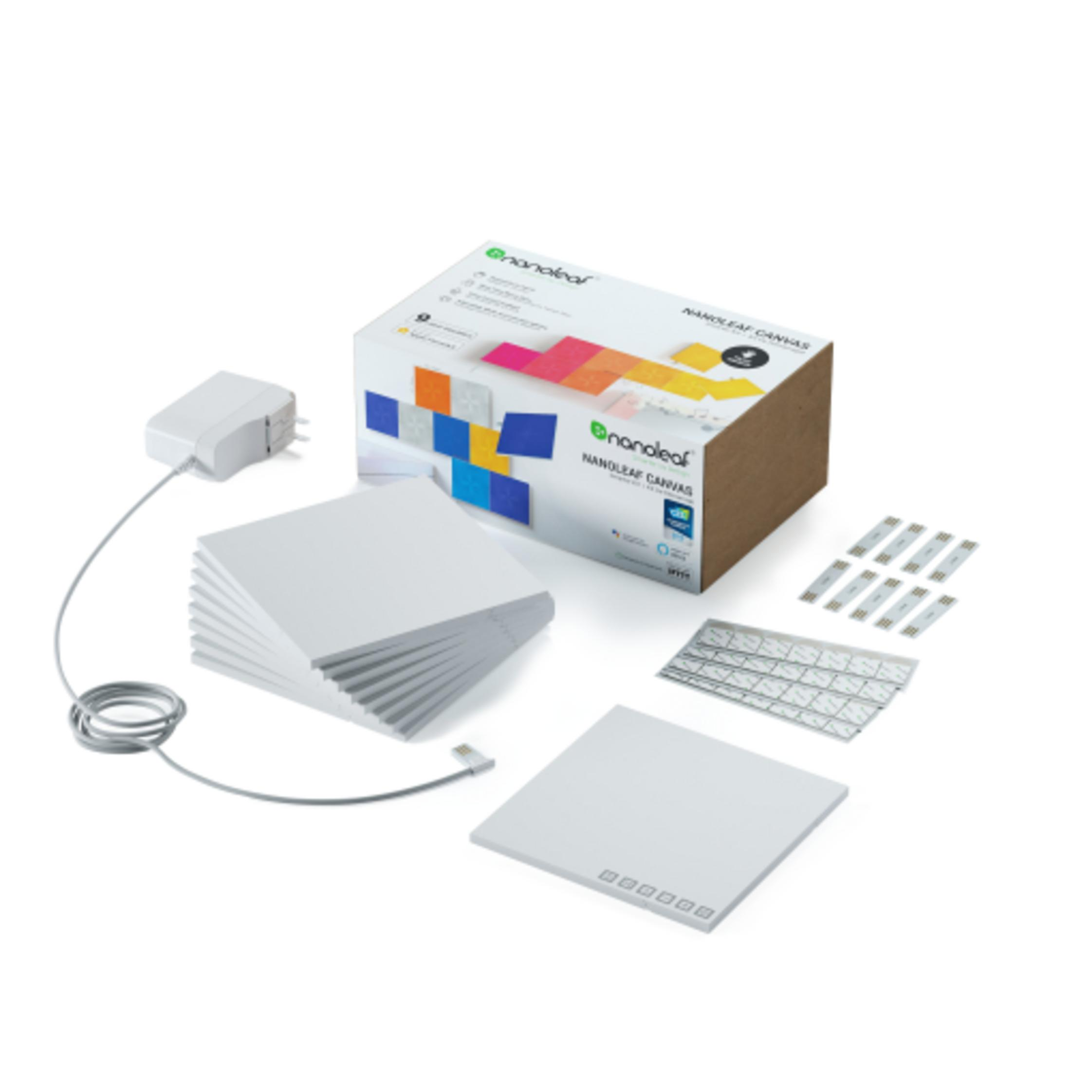 Nanoleaf Canvas Set mit Netzteil, Kabel, Halterungen und vielen weißen Platten.
