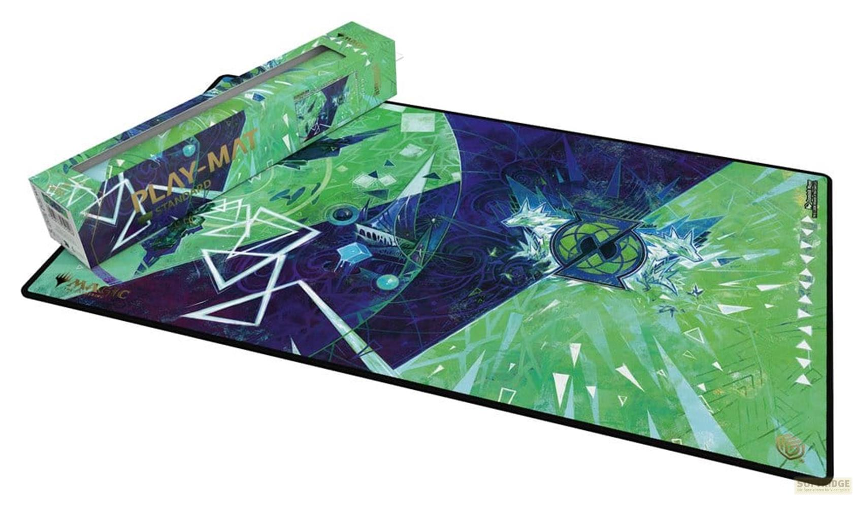 Tapis de jeu vert et violet avec motifs géométriques et dragons. Boîte en carton à côté.