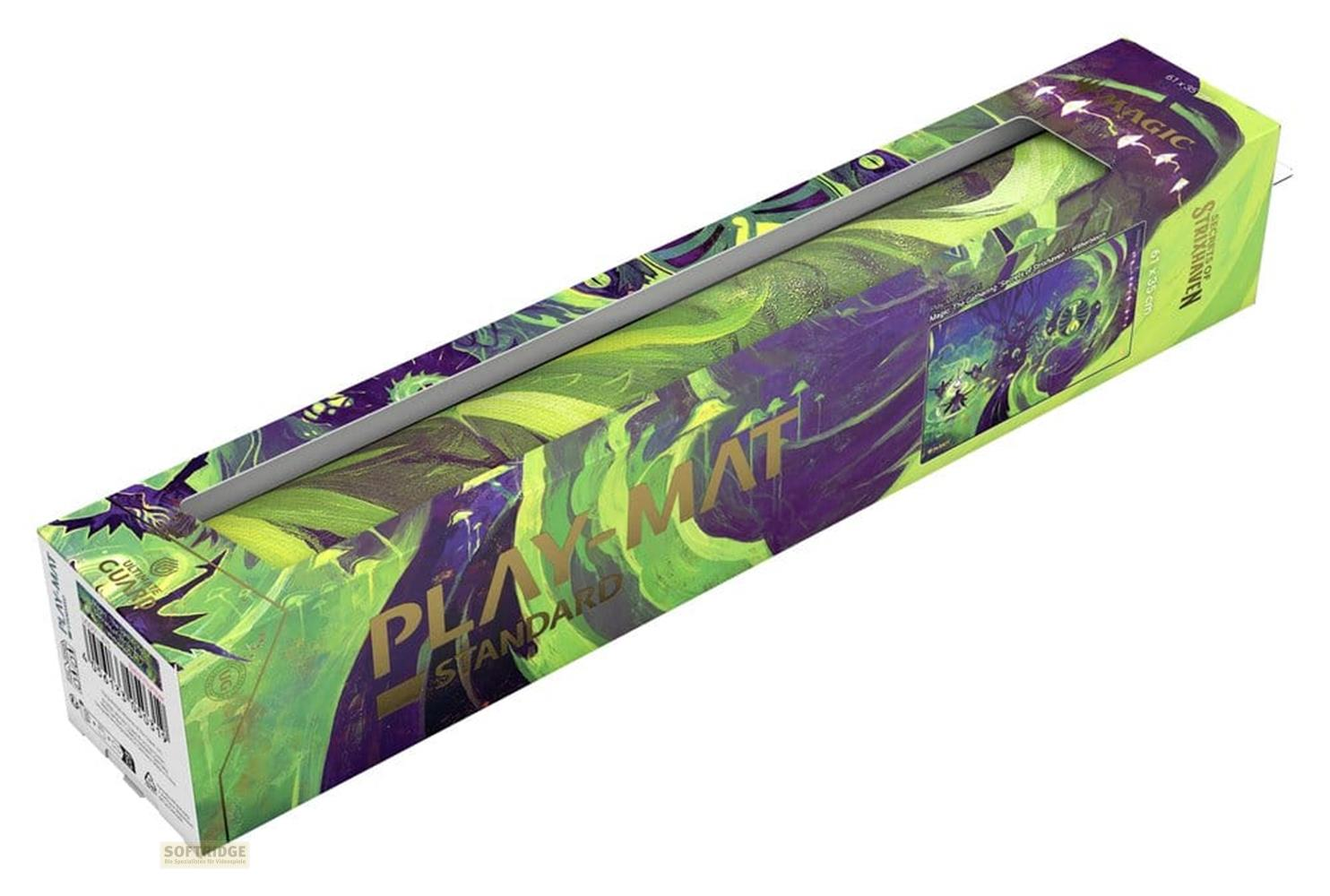 Verpackung einer Spielmatte mit grün-violetter Dschungel-Grafik und Magic-Logo.