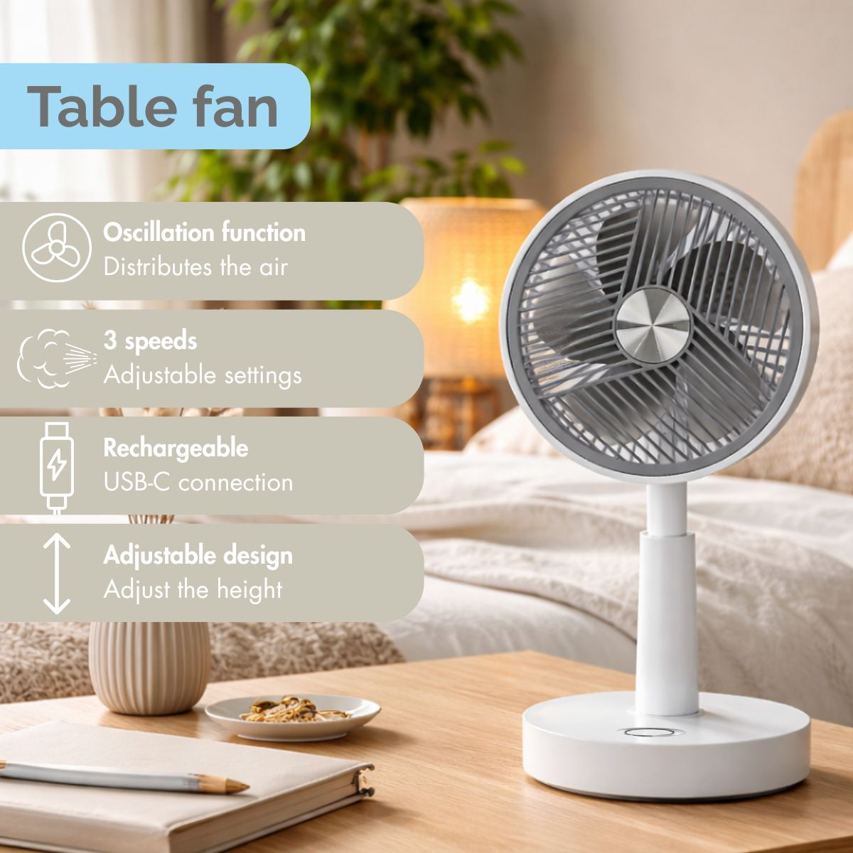 A white table fan with three speeds and oscillation function stands on a wooden table.