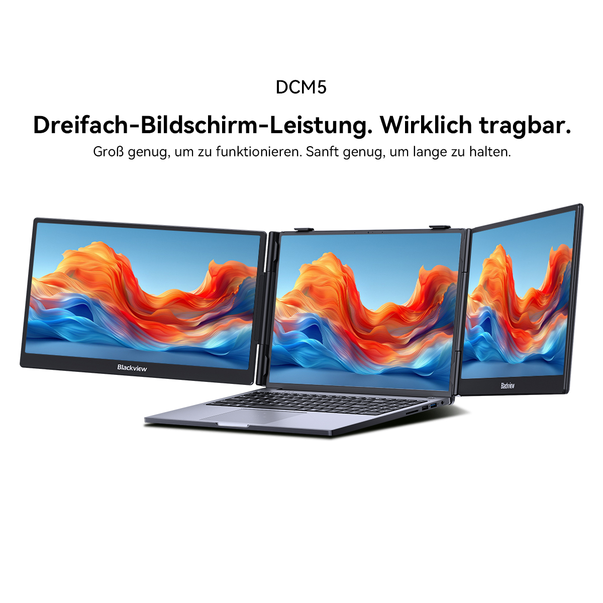 Ein Laptop mit drei angeschlossenen Bildschirmen, die abstrakte Kunst zeigen.