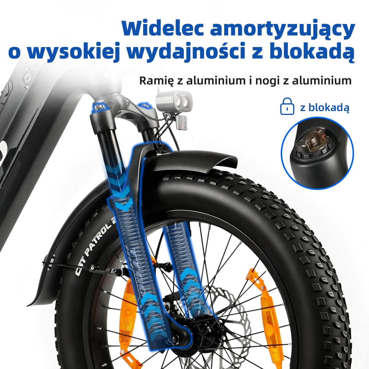 Zbliżenie przedniego widelca roweru z niebieskim amortyzatorem i grubą oponą.