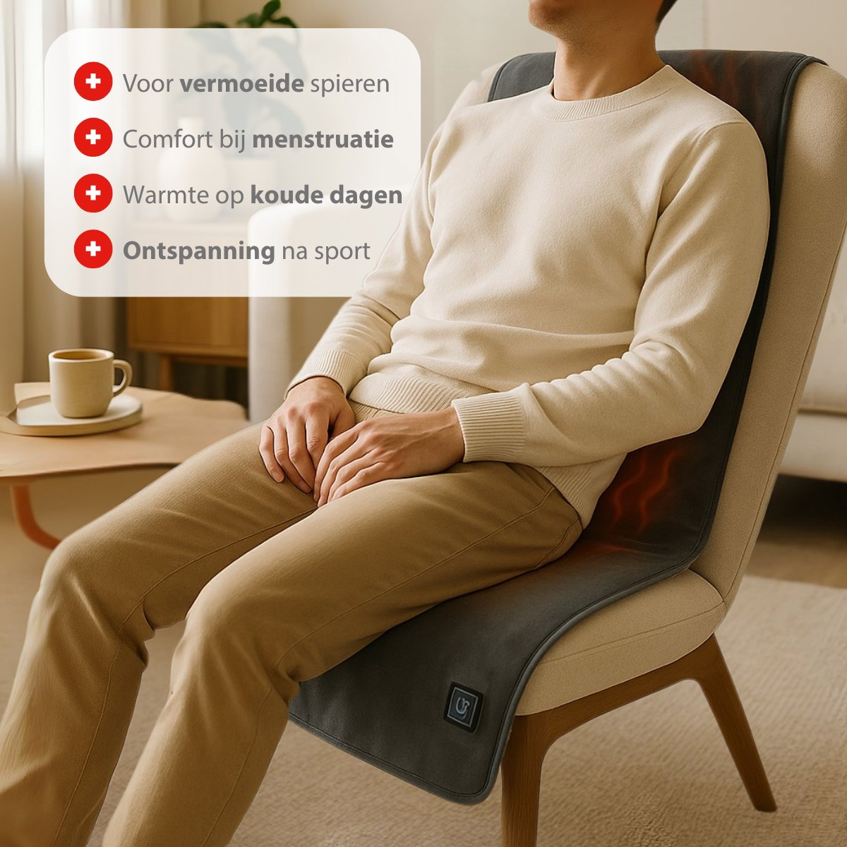 Man sits on a chair with a heating pad. Text lists benefits for muscles.