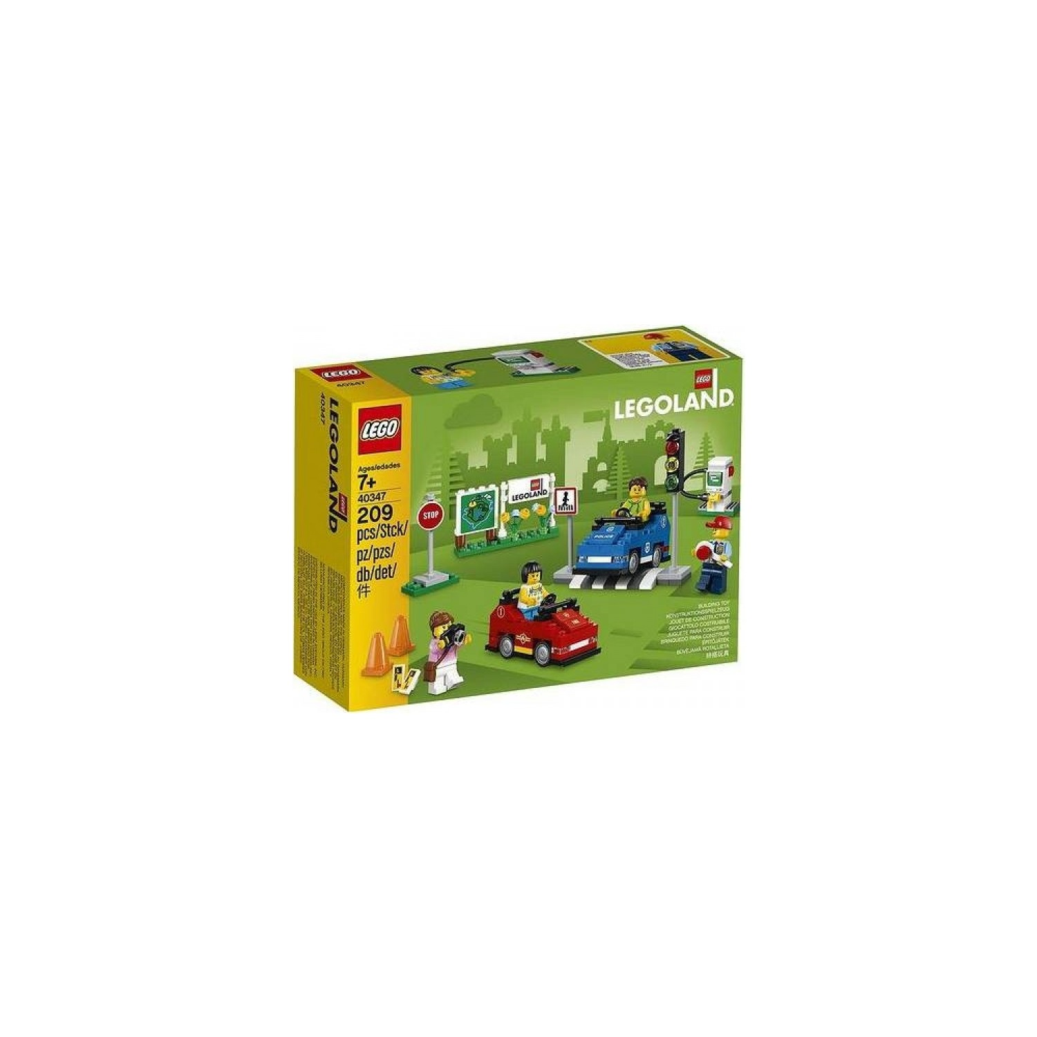 Kırmızı ve mavi arabalar, figürler ve trafik işaretleri içeren LEGO Legoland yapım seti.
