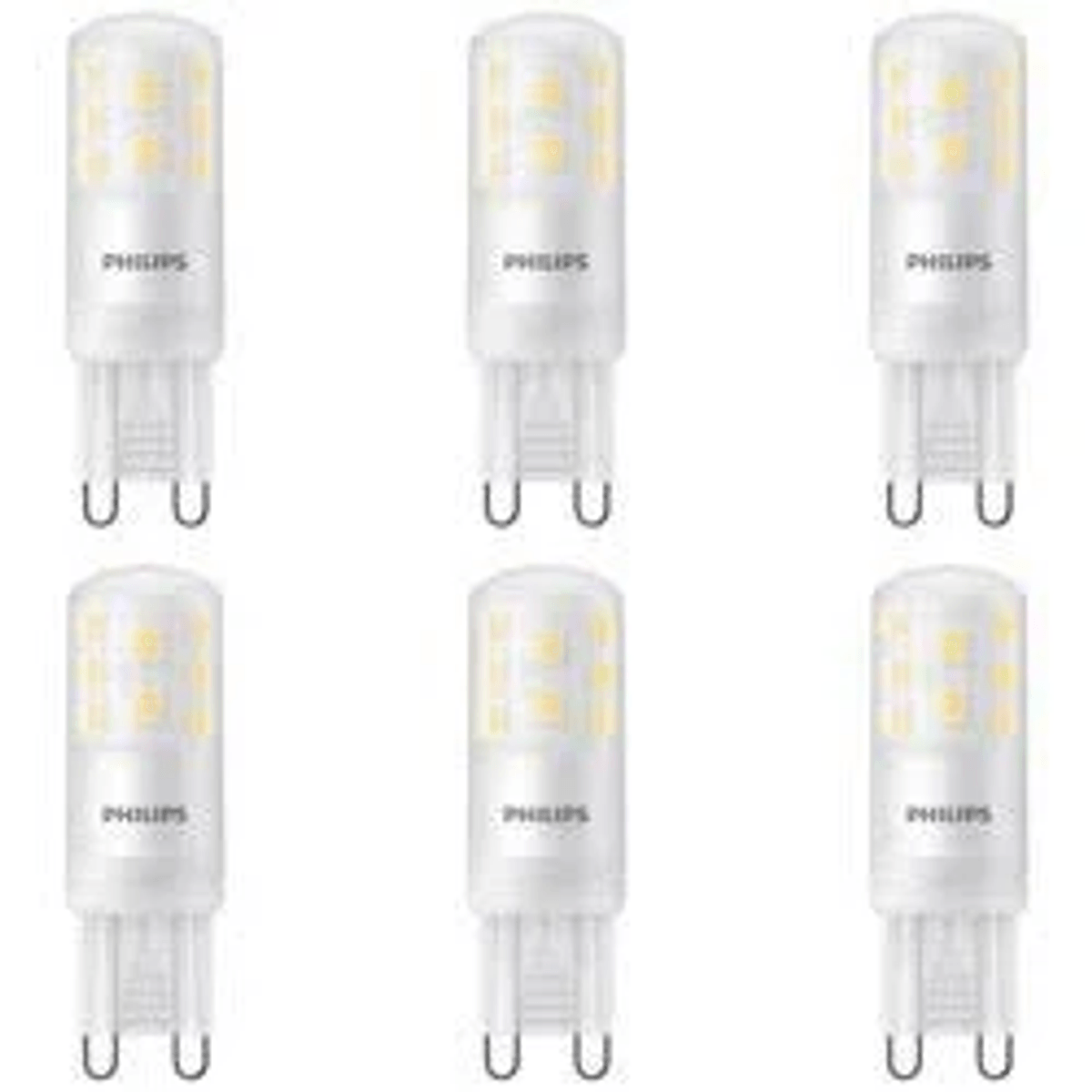 Six white Philips LED bulbs with G9 base on a white background.