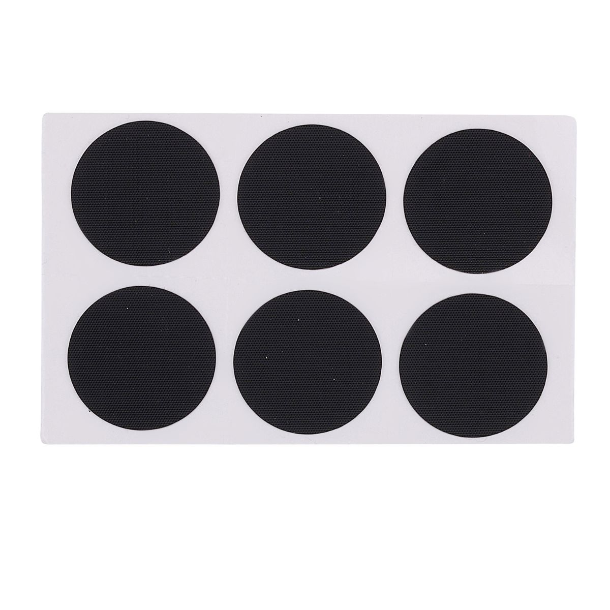 Zes zwarte, ronde stickers met gestructureerd oppervlak op een wit draagblad.