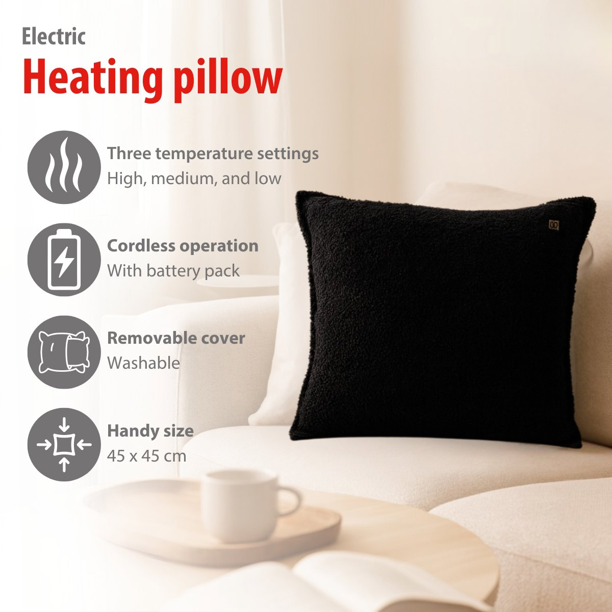 Black heating pillow on a sofa, featuring temperature settings, cordless operation.