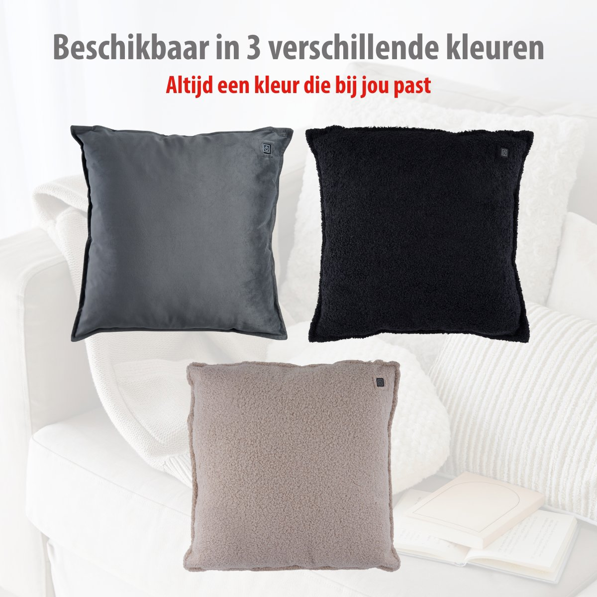 Three pillows in grey, black, and beige on a sofa.