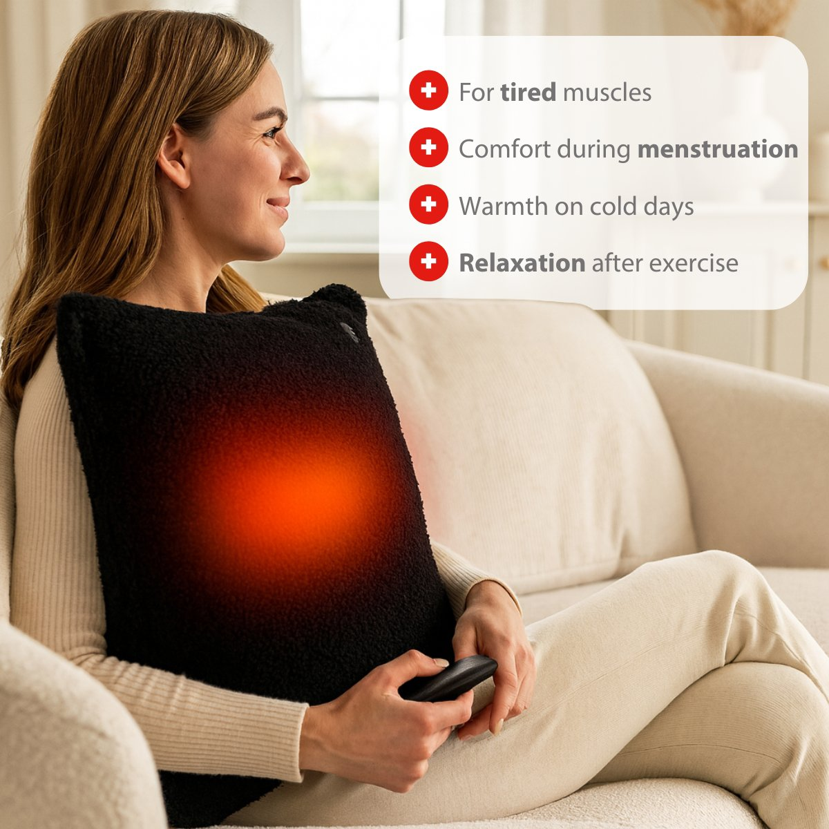 Woman holding heated black pillow with remote. Text lists benefits.