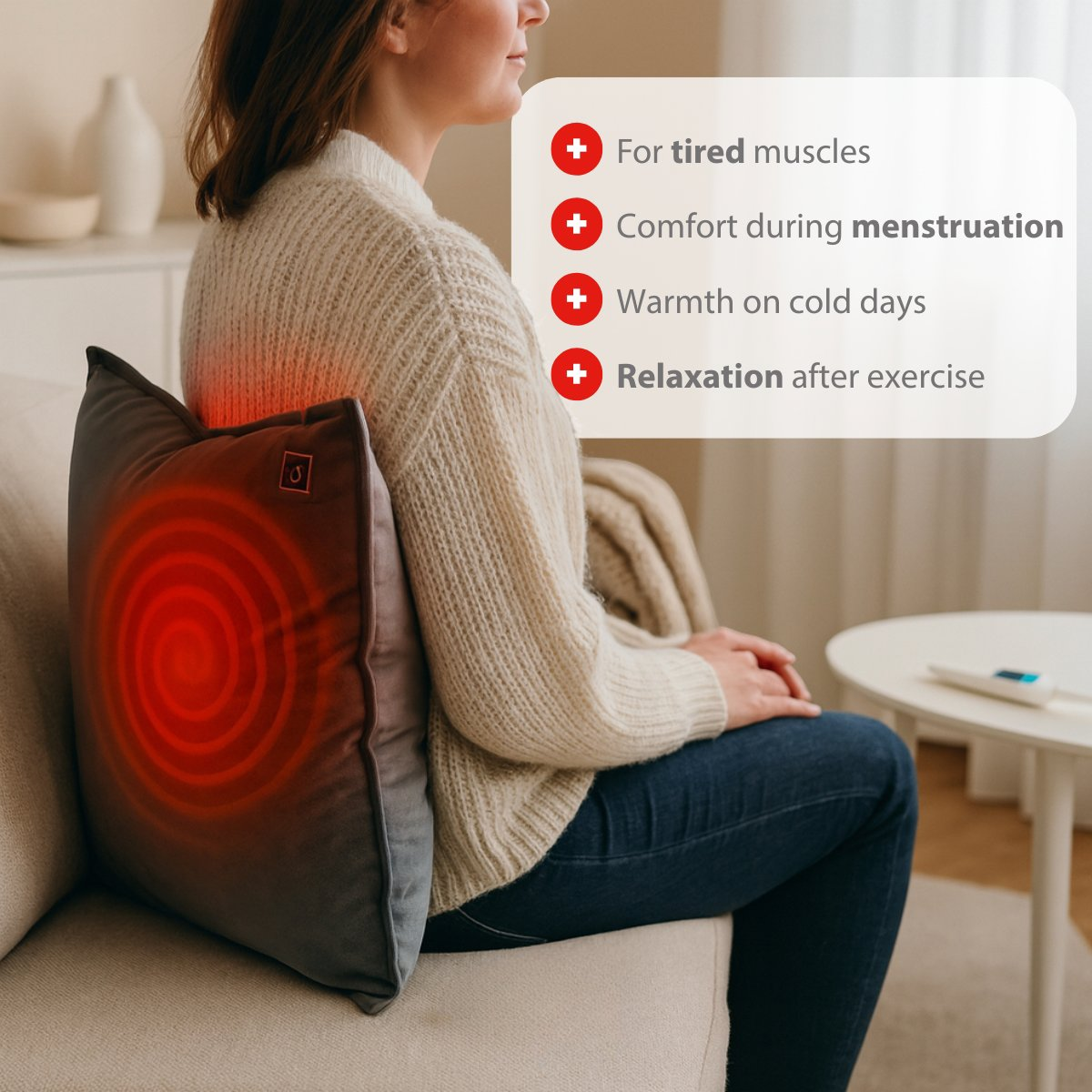 Woman sits on sofa with heated cushion behind her. Benefits are listed.