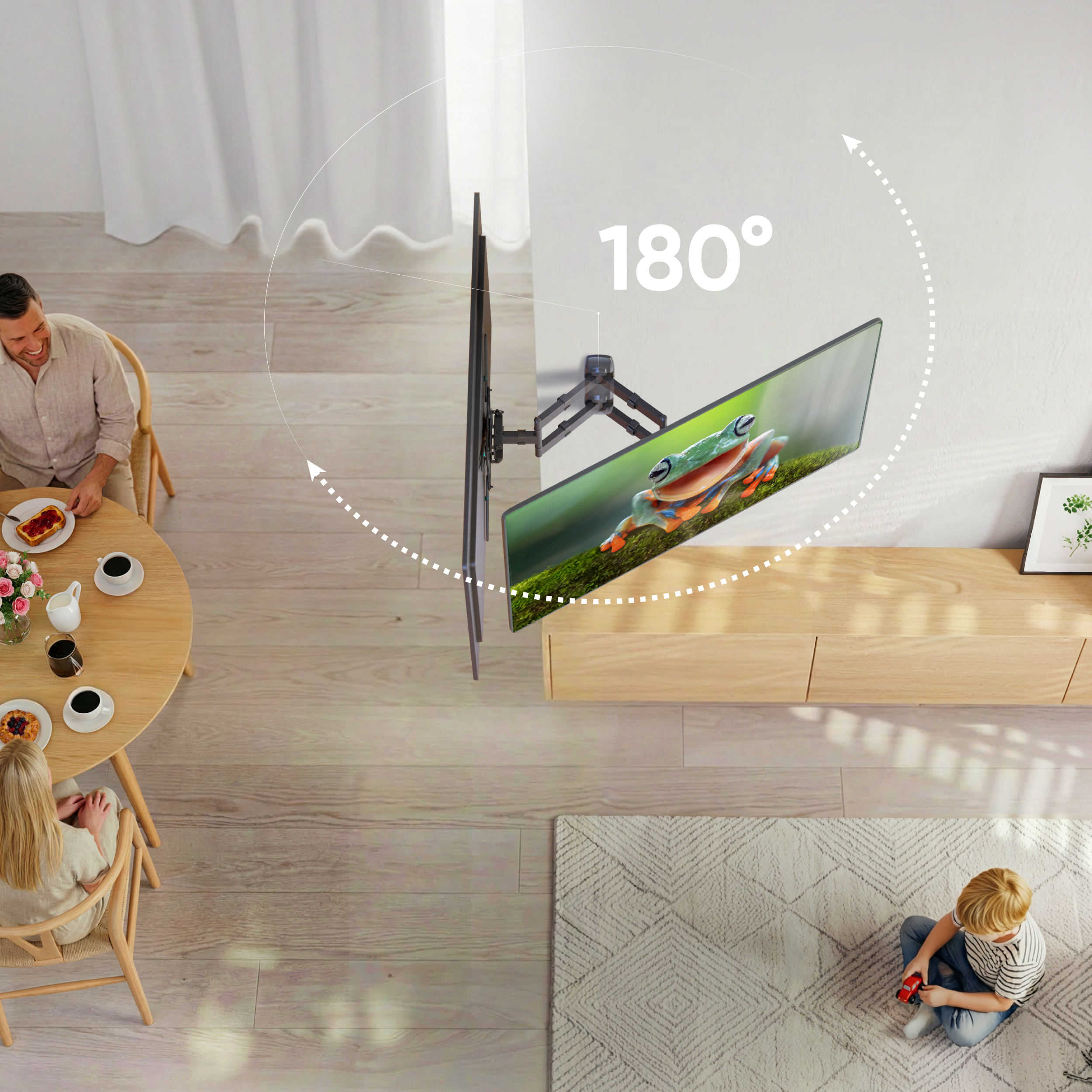 Rodzina je, dziecko bawi się. Uchwyt TV pokazuje obrót 180°.
