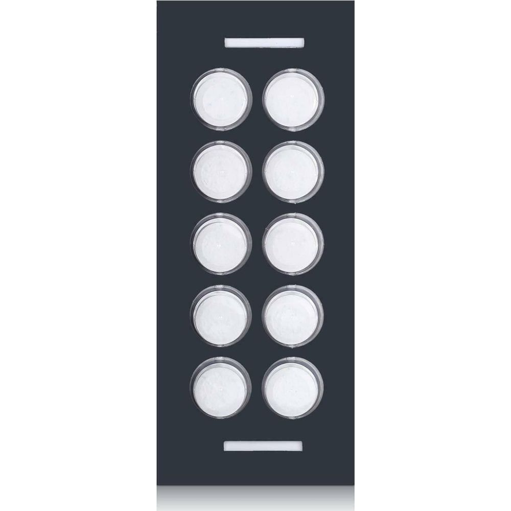 Dark gray rectangle with eight circular indentations filled with white powder.