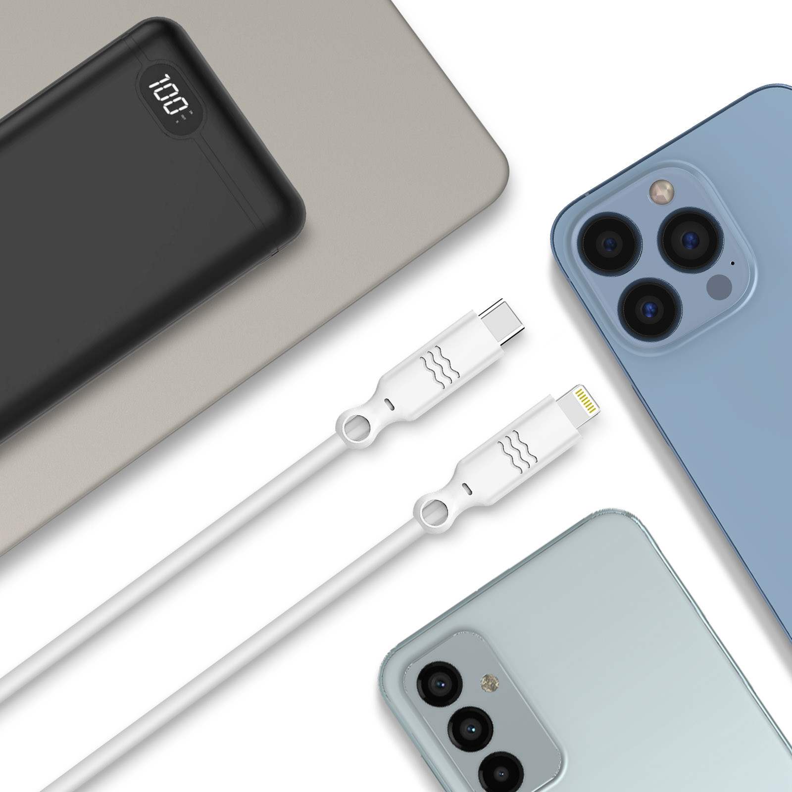 Schwarzes Ladegerät, weiße Kabel, blaues und hellblaues Smartphone.